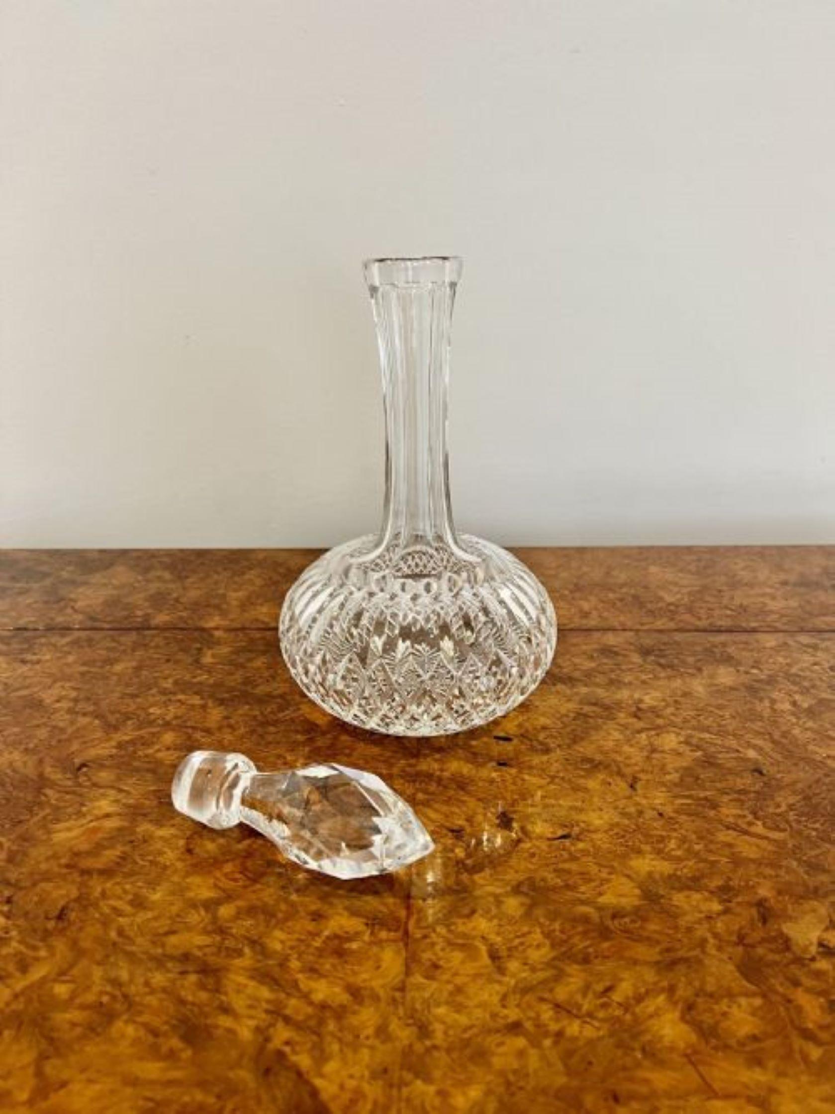 Pair of antique Edwardian cut glass decanters, Having a quality pair of cut glass shaped decanters with the original cut glass diamond shaped stoppers. One stopper slightly chipped to the top.