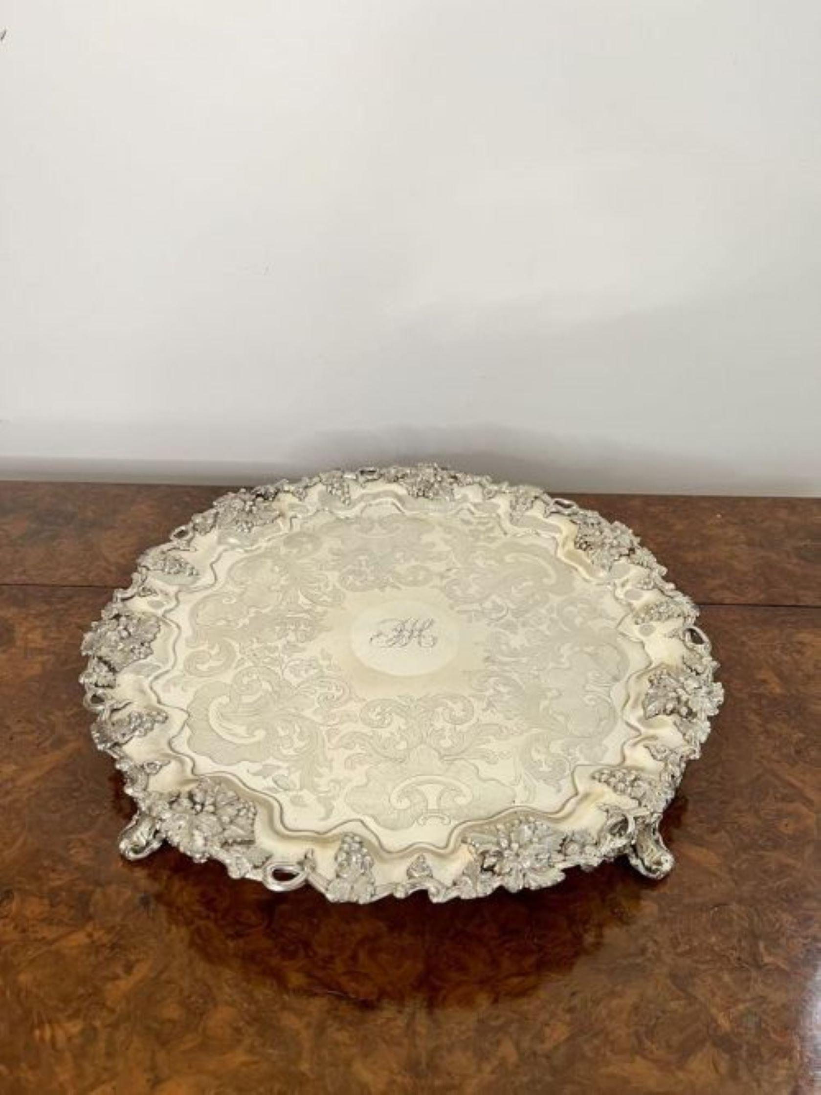 Pair of antique Edwardian engraved silver plated trays having a quality pair of antique Edwardian silver plated trays both with an engraved centre and a fantastic ornate boarder raised on three shaped feet. 
Large tray H 5cm W 37cm D37cm
Small tray