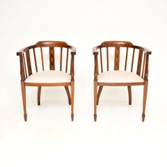 Paire de fauteuils anciens édouardiens en noyer marqueté