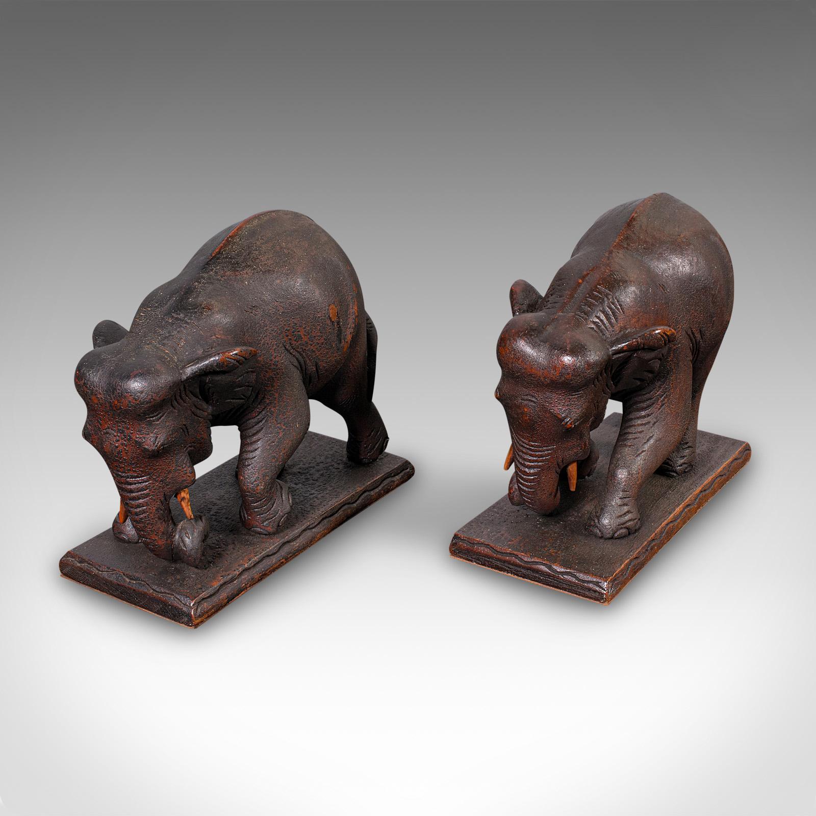 
This is a pair of antique elephant bookends. An English, mahogany ornamental wildlife study, dating to the late Victorian period, circa 1900. 

Fascinating bookends with fine anatomical form
Displaying a desirable aged patina throughout
Select