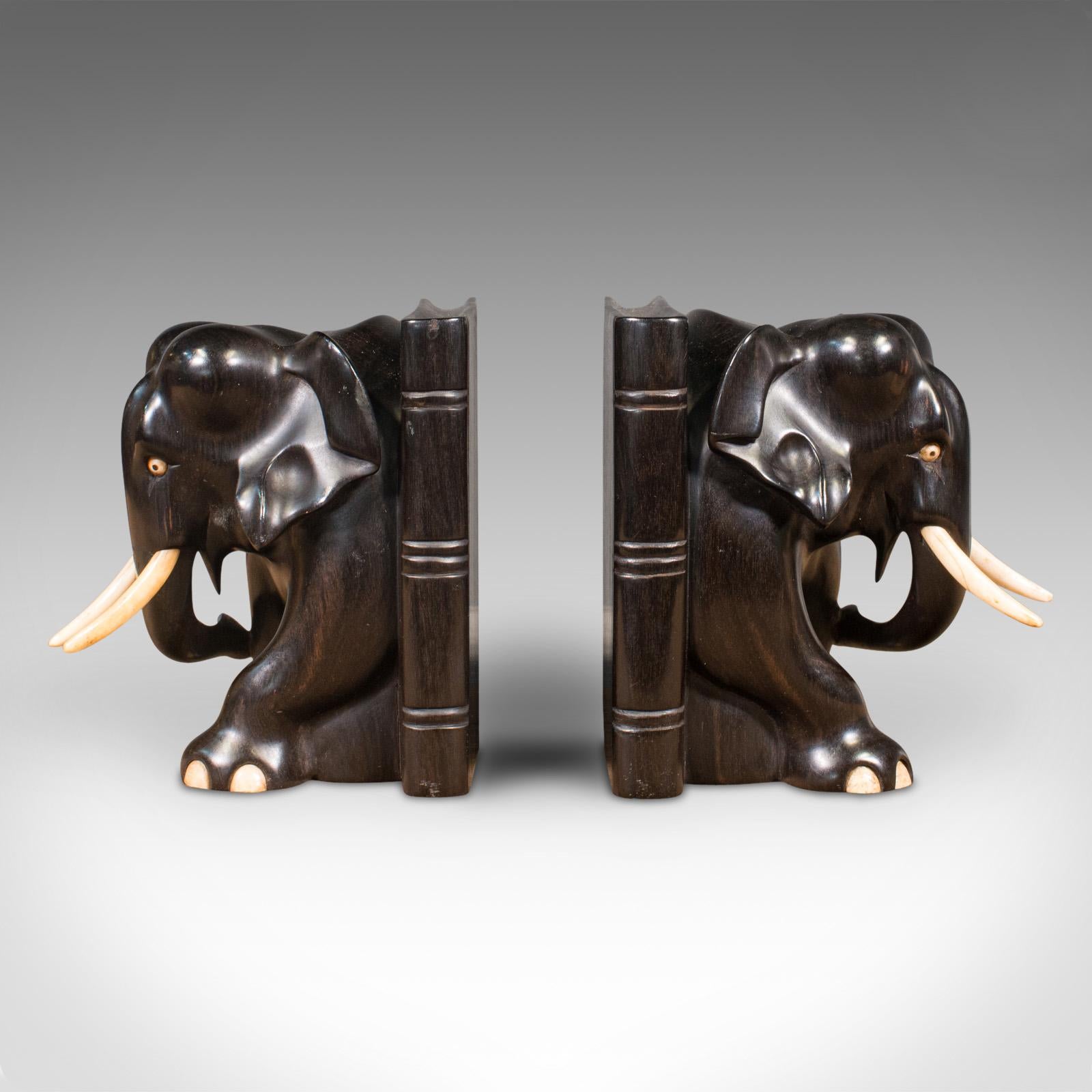 This is a pair of antique elephant bookends. An English, ebony and bone carved animal book rest, dating to the late Victorian period, circa 1890.

Superb character, offering a real treat for the book shelf
Displaying a desirable aged patina and