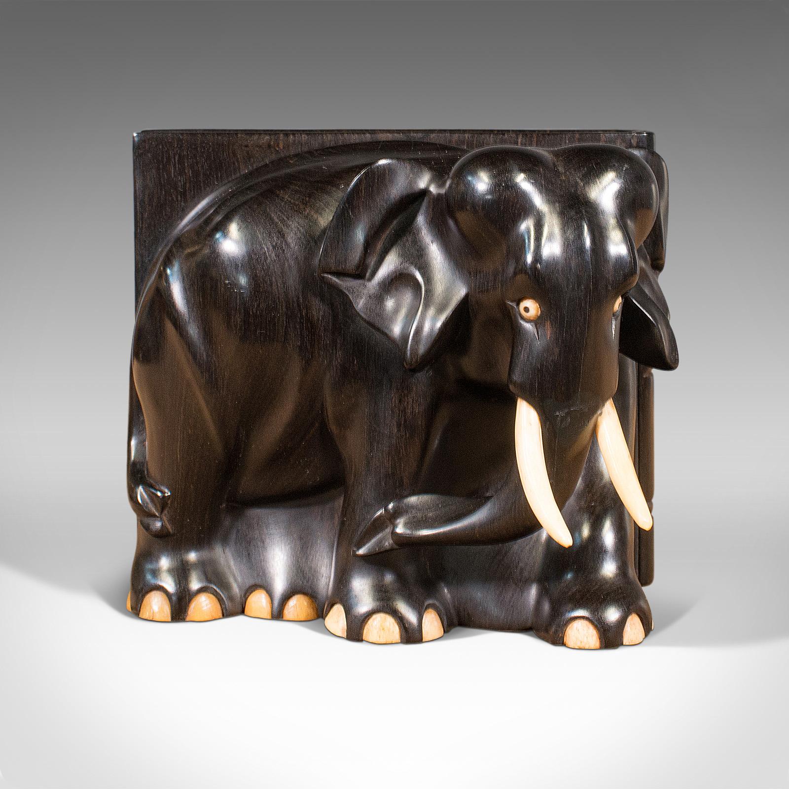 antique ebony and ivory elephants