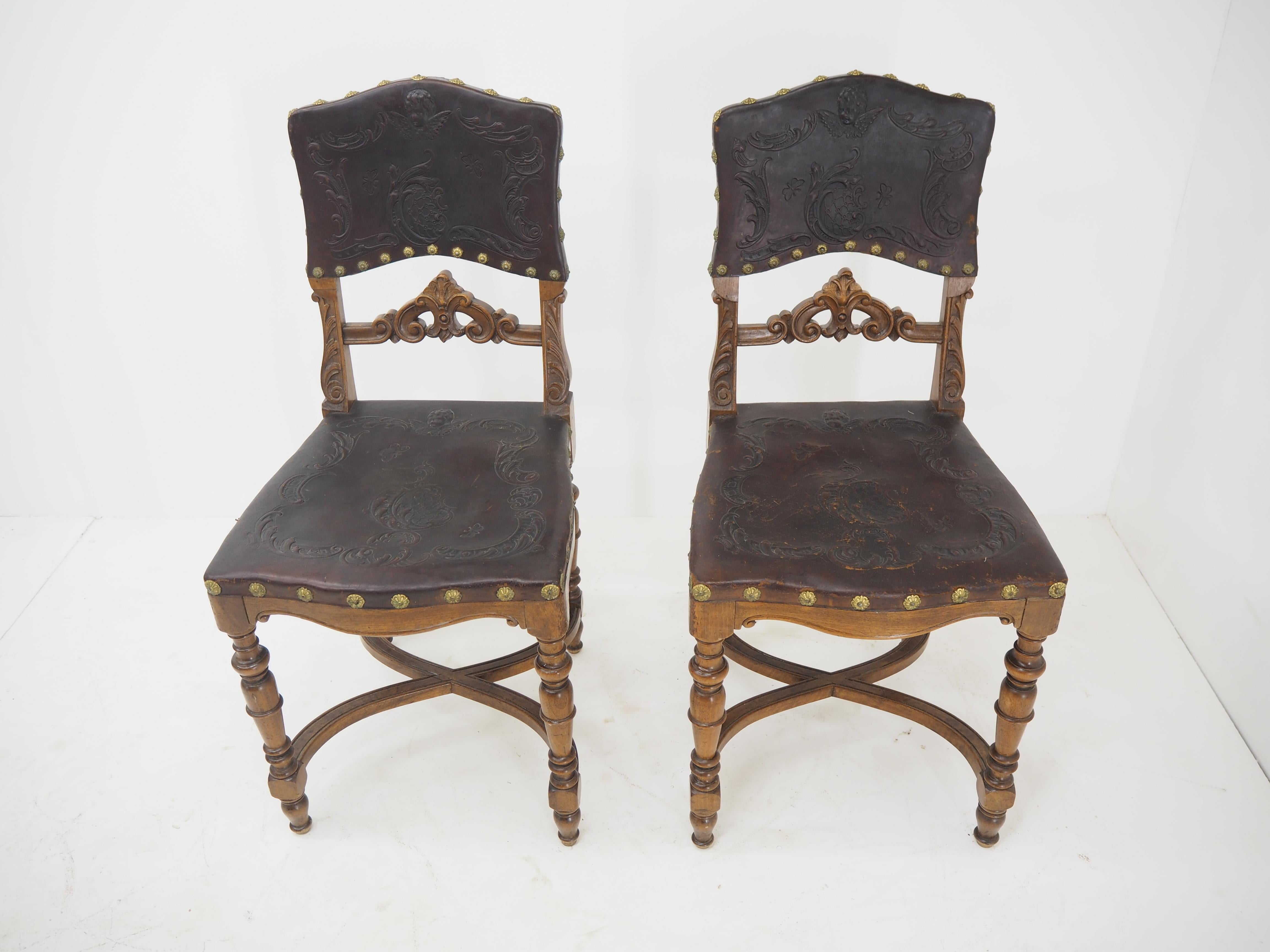 European Pair of Antique Embossed Leather Chairs