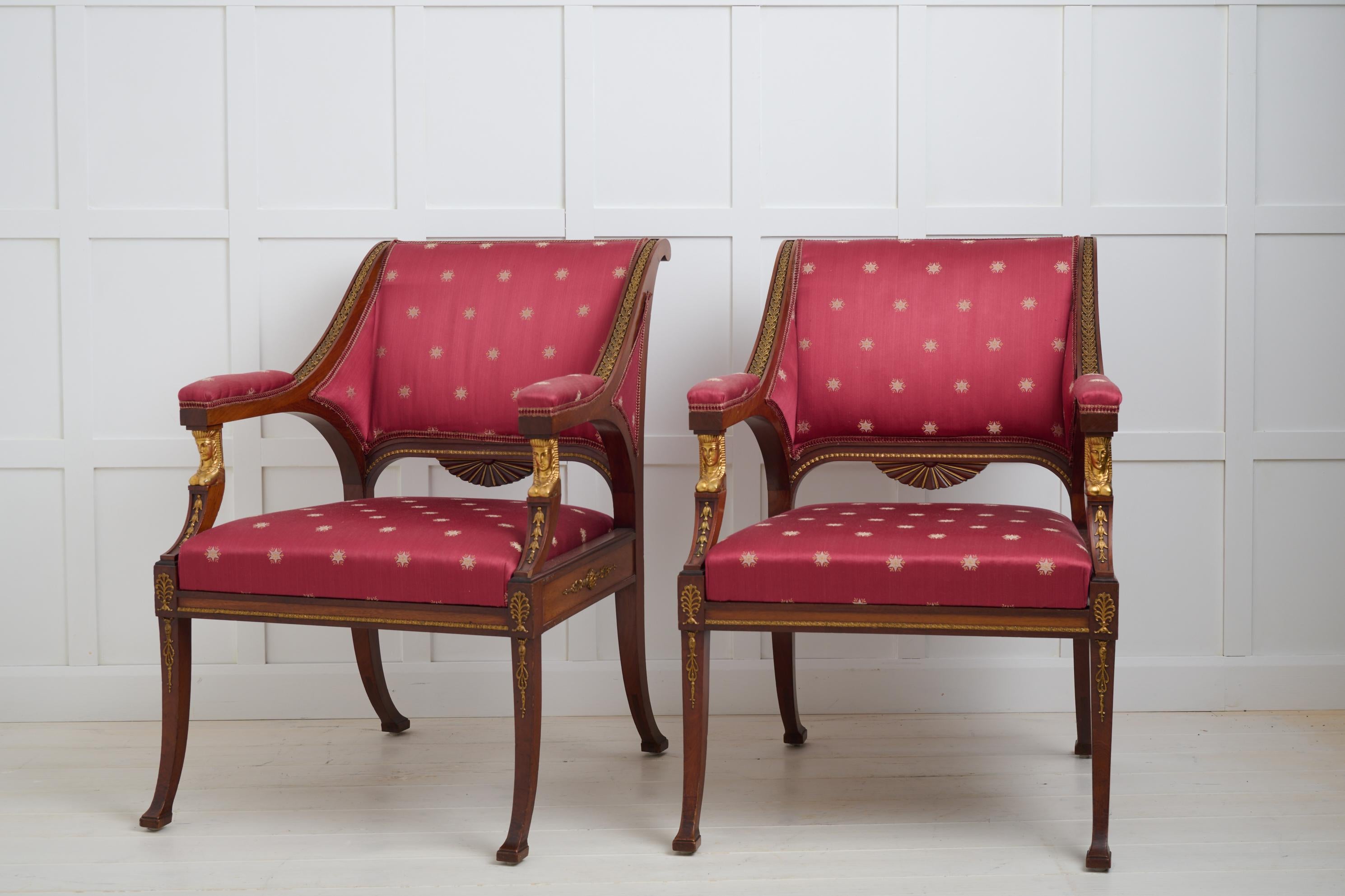 Swedish Pair of Antique Empire Mahogany Armchairs, Brass and Gilded Decor For Sale