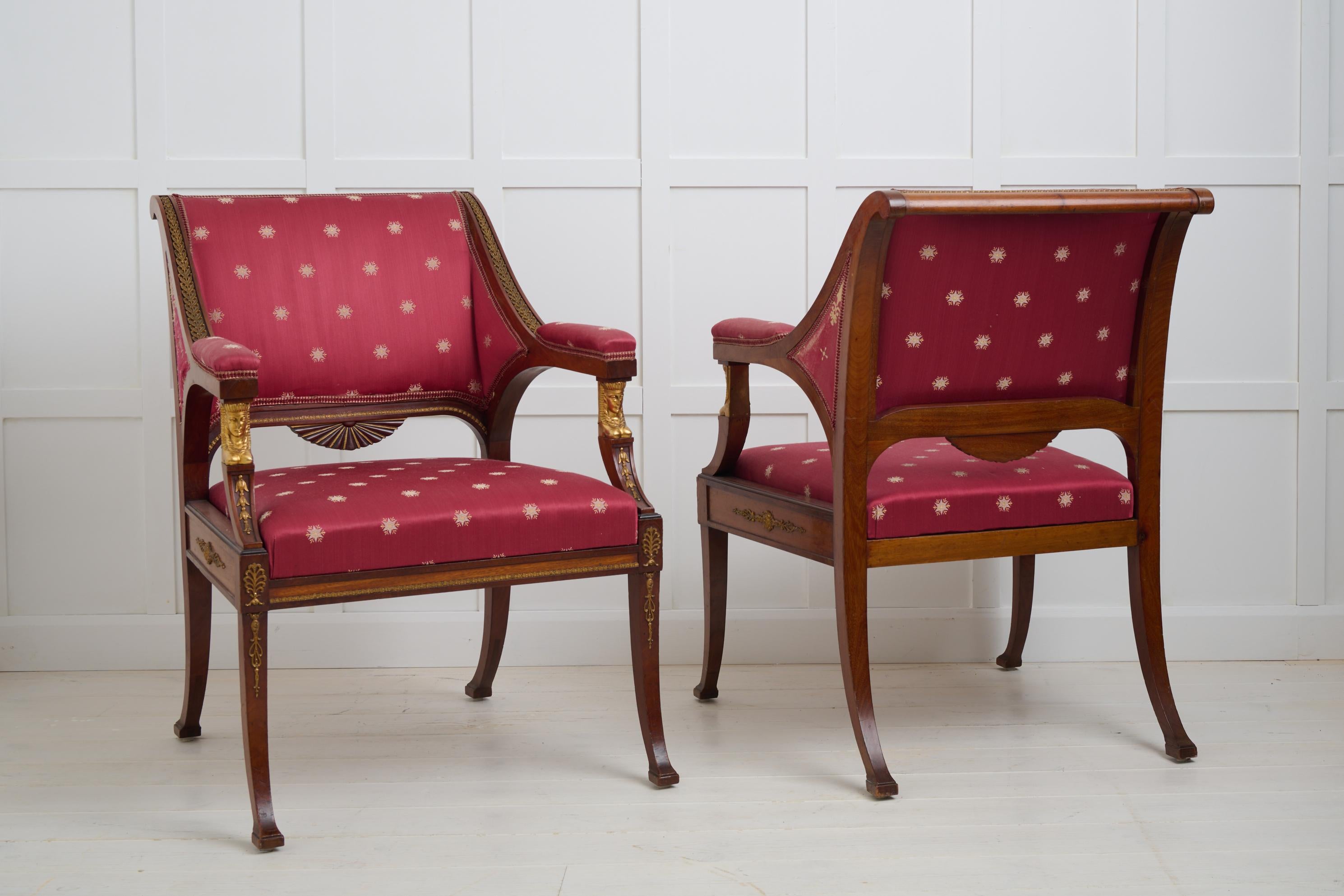 Pair of Antique Empire Mahogany Armchairs, Brass and Gilded Decor In Good Condition For Sale In Kramfors, SE