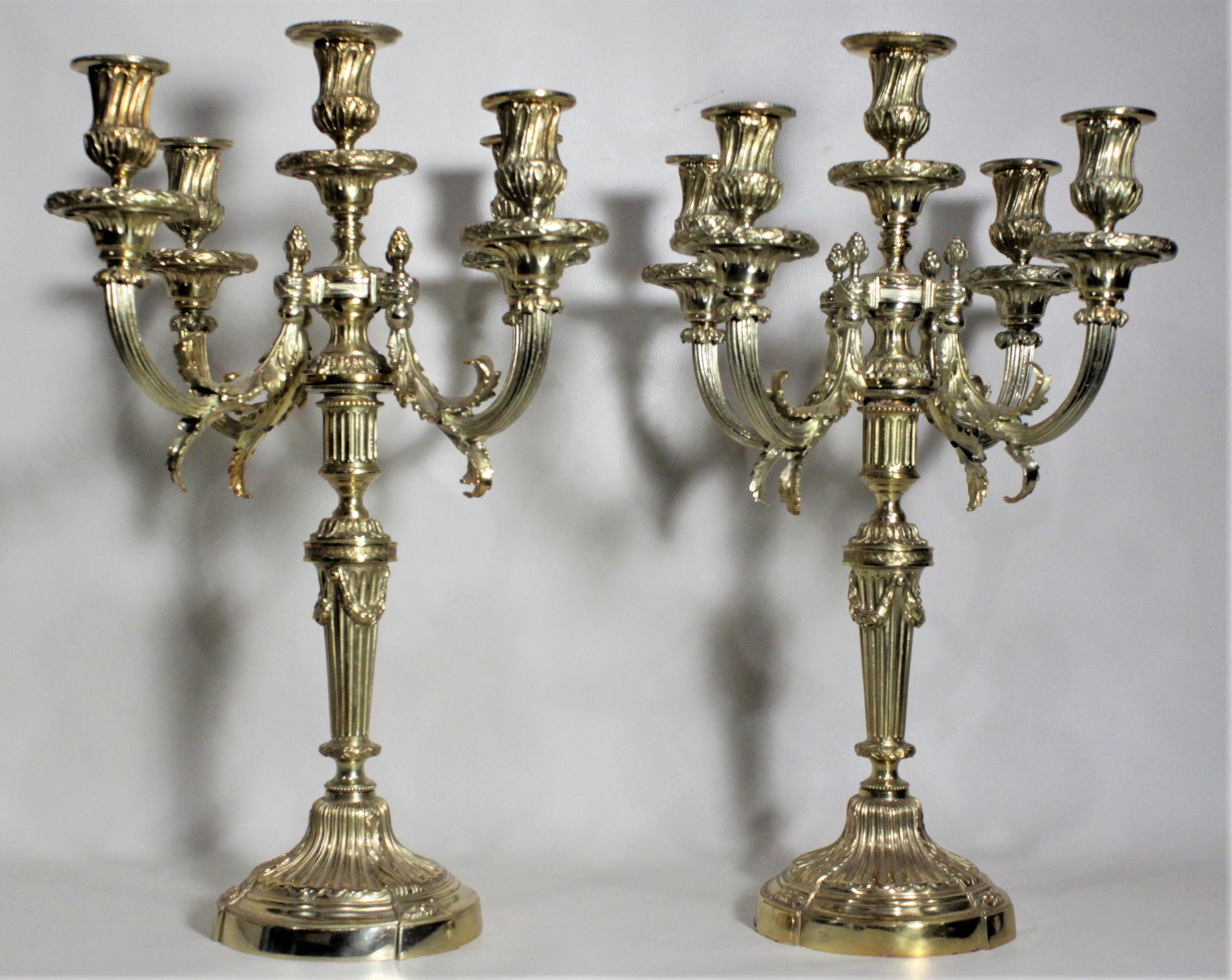 20th Century Pair of Antique Empire Style Four Branch Gilt Bronze Candelabras For Sale