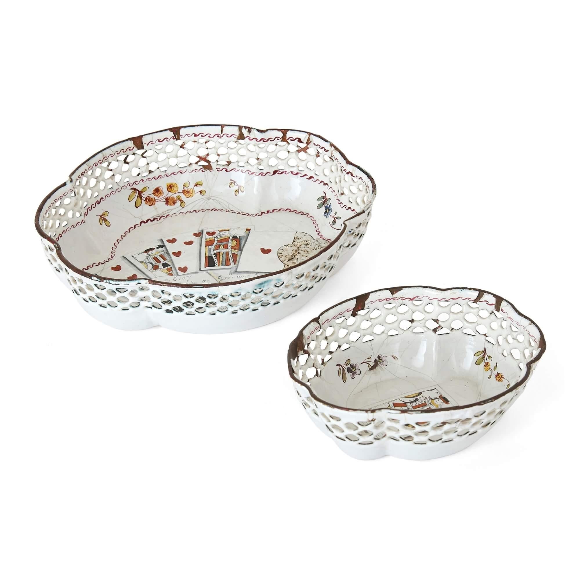 Pair of antique enamelled Staffordshire English dishes with playing cards
English, early 19th Century
Larger dish: Height 3.5cm, width 13cm, depth 11.5cm
Smaller dish: Height 3cm, width 9cm, depth 7.5cm

This charming and delicate pair of
