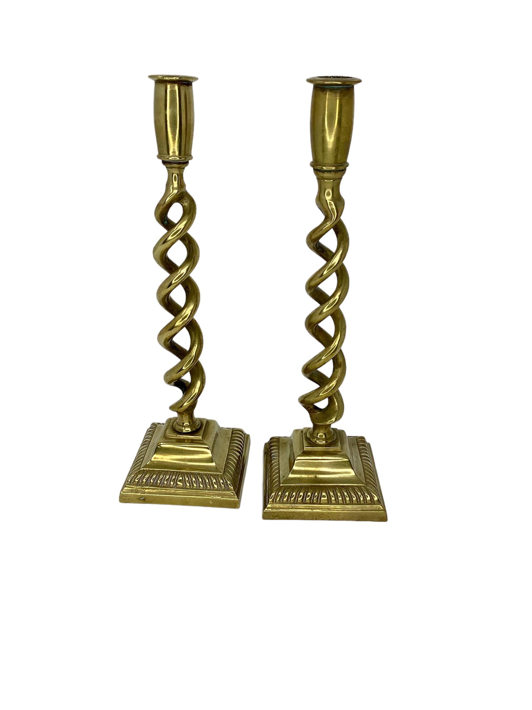 Pair of Antique English Barley Candlesticks? Spiral twist sits a cast stepped base.