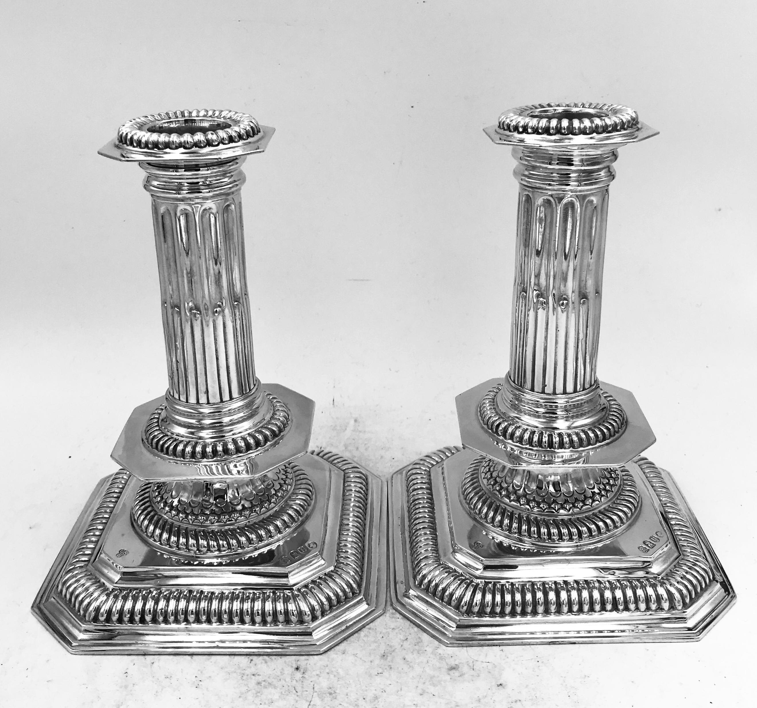 A Pair of Antique English Victorian Sterling Silver Candlesticks made by Charles Stuart Harris, and hallmarked London 1883. 
These candlesticks are nineteenth century examples of candlesticks originally made in England in the late seventeenth and