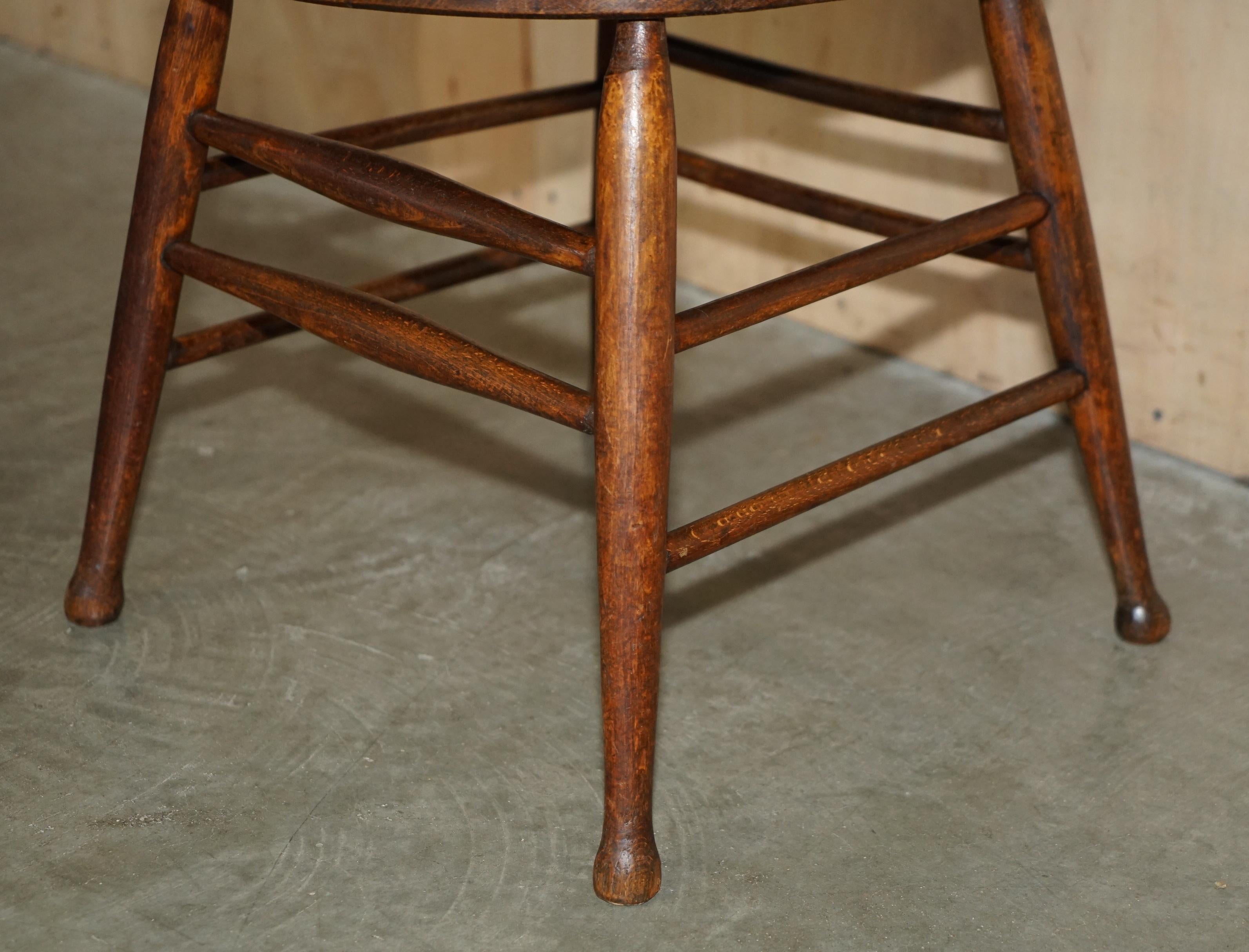 PAiR OF ANTIQUE ENGLISH ELM WINDSOR STICK BACK CHAIRS STAMPED LEA HALL INFANTRY For Sale 3