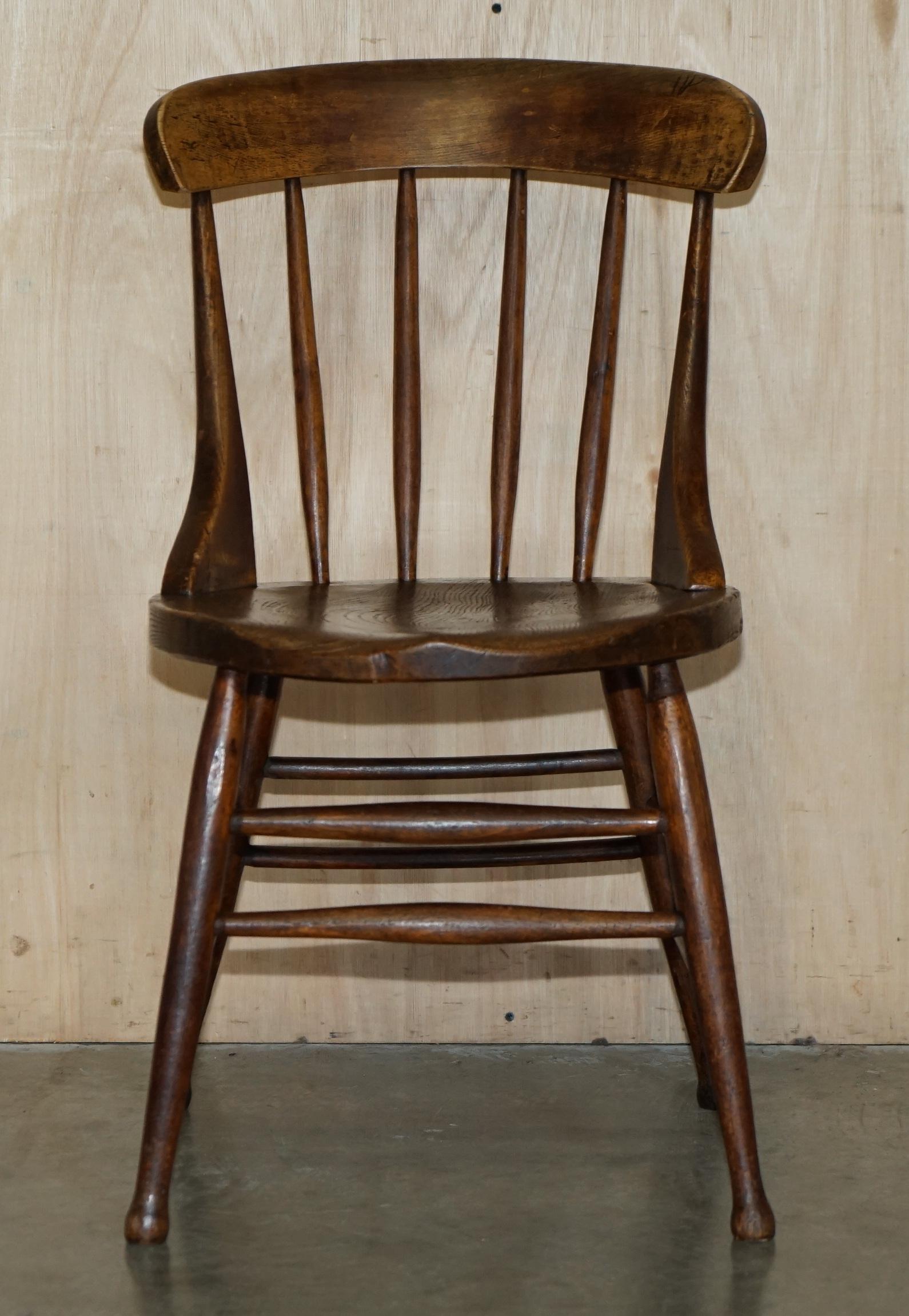 Hand-Crafted PAiR OF ANTIQUE ENGLISH ELM WINDSOR STICK BACK CHAIRS STAMPED LEA HALL INFANTRY For Sale