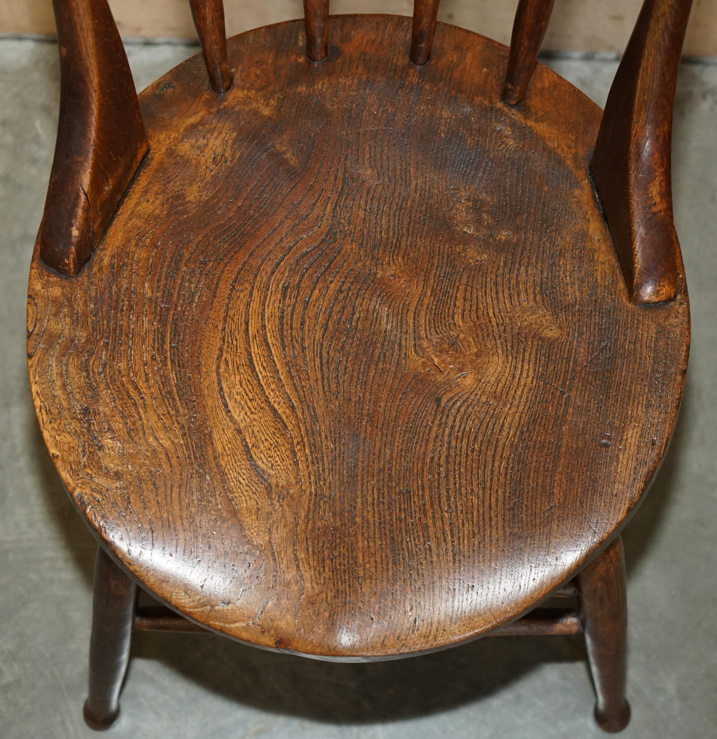 Elm PAiR OF ANTIQUE ENGLISH ELM WINDSOR STICK BACK CHAIRS STAMPED LEA HALL INFANTRY For Sale