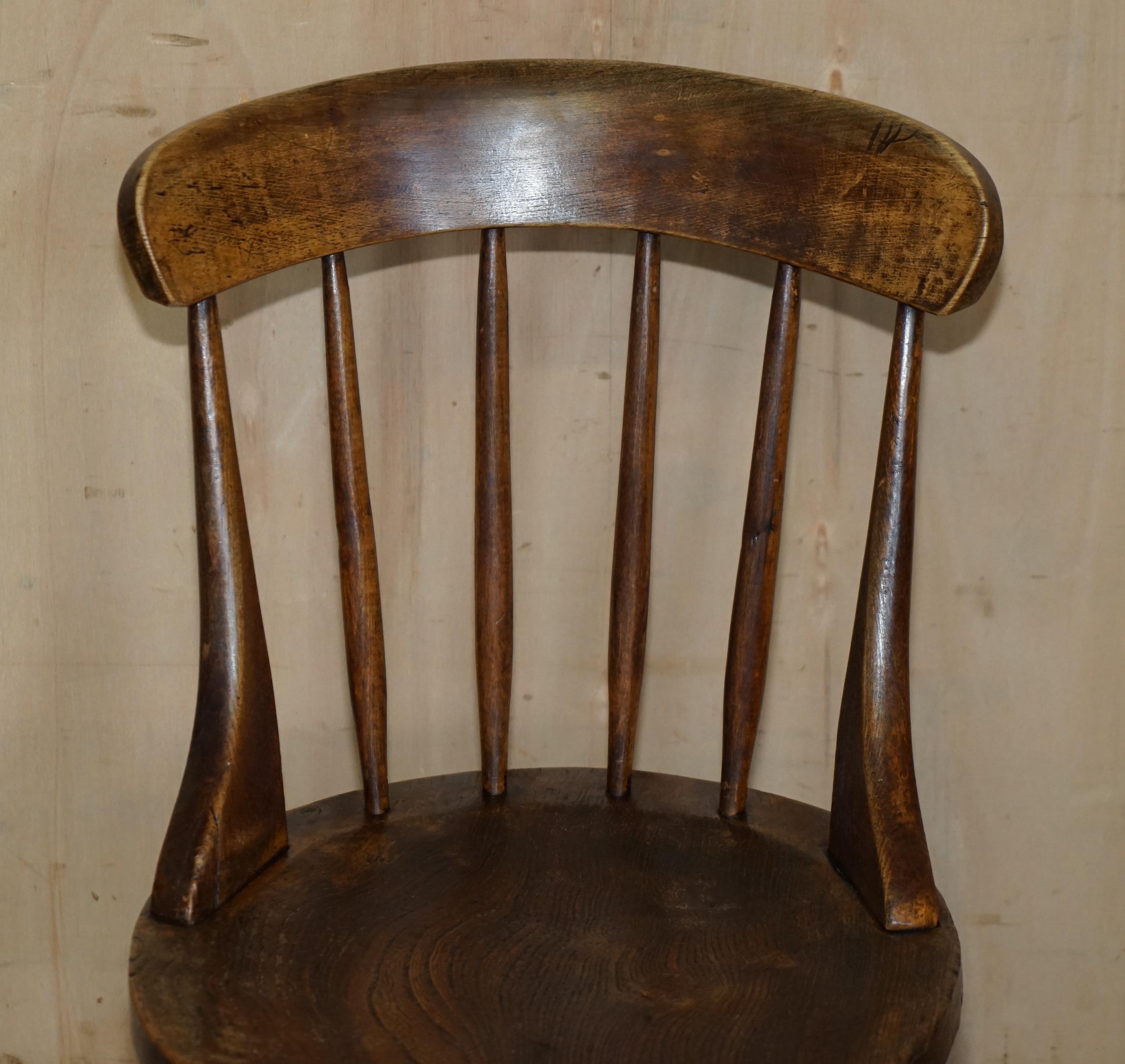 PAiR OF ANTIQUE ENGLISH ELM WINDSOR STICK BACK CHAIRS STAMPED LEA HALL INFANTRY For Sale 1