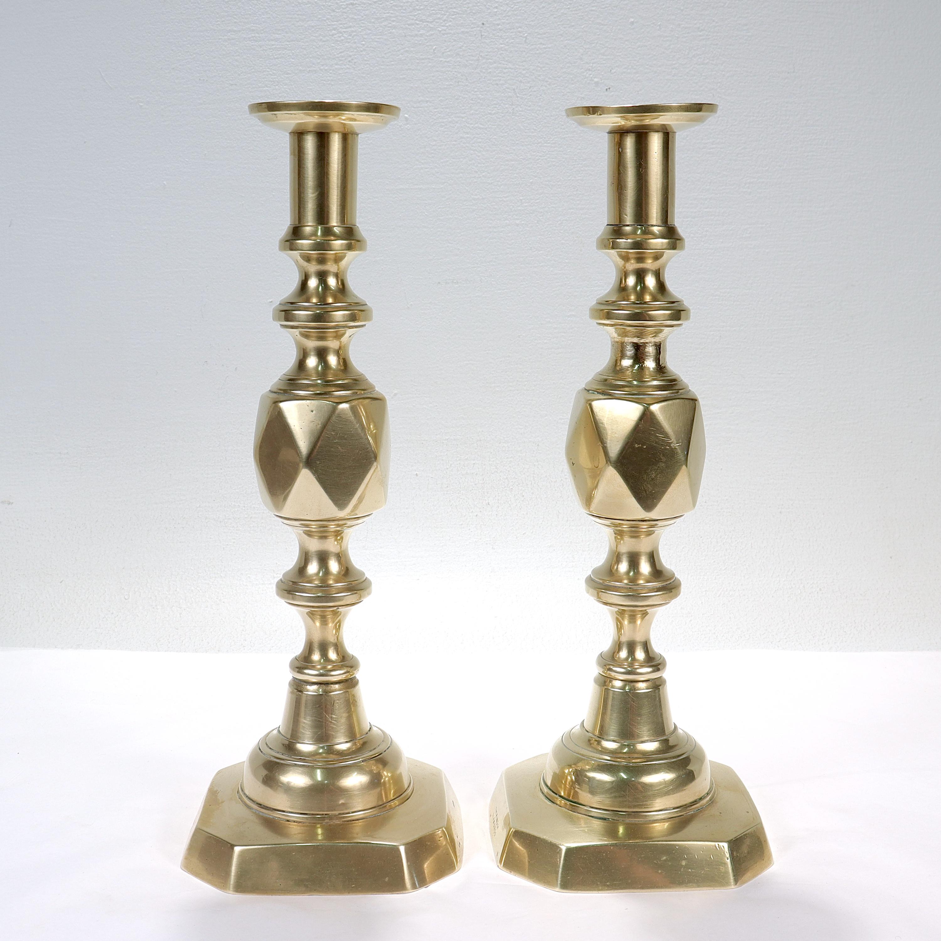 Pair of Antique English King of Diamonds Brass Candlesticks In Fair Condition For Sale In Philadelphia, PA