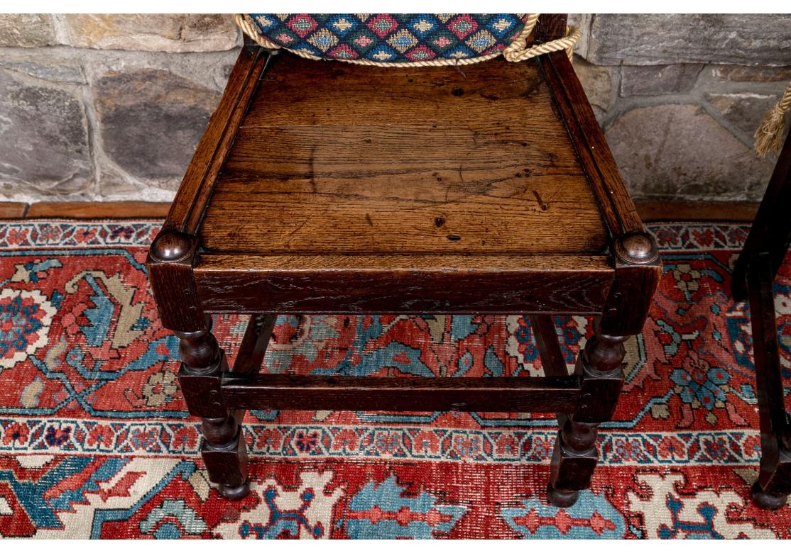 Pair Of Antique English Oak Jacobean Style Hall Chairs For Sale 1