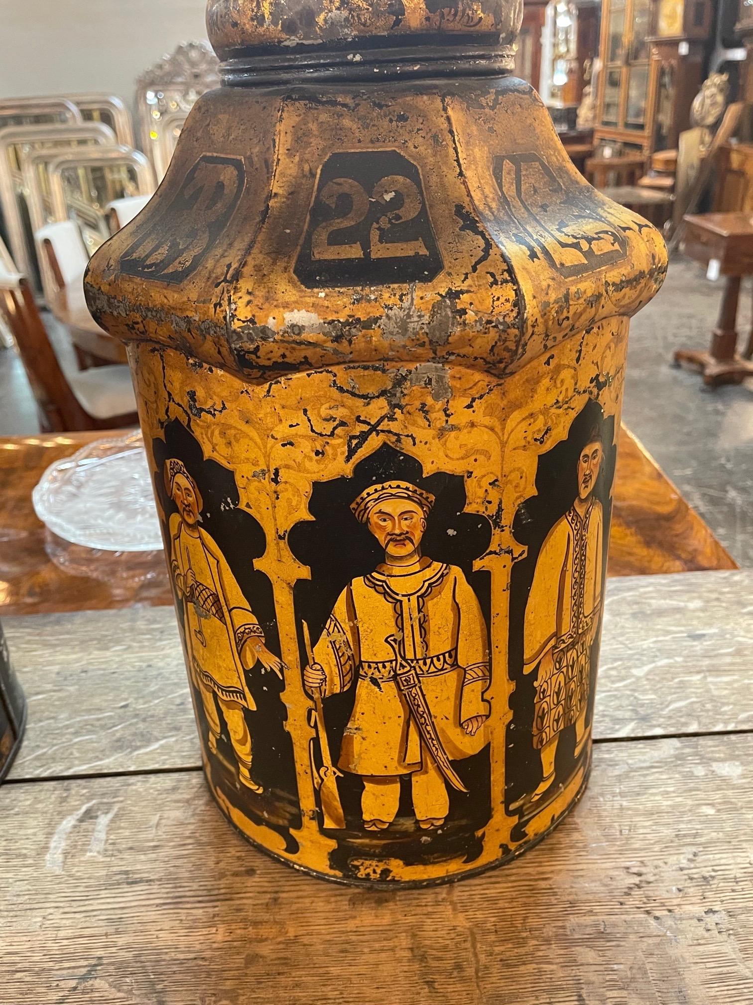 Interesting pair of antique English painted tole chinoiserie tea can lamps. Very nice patina and a great decorative look! Wired and ready to go. Note: 28 inches overall height.