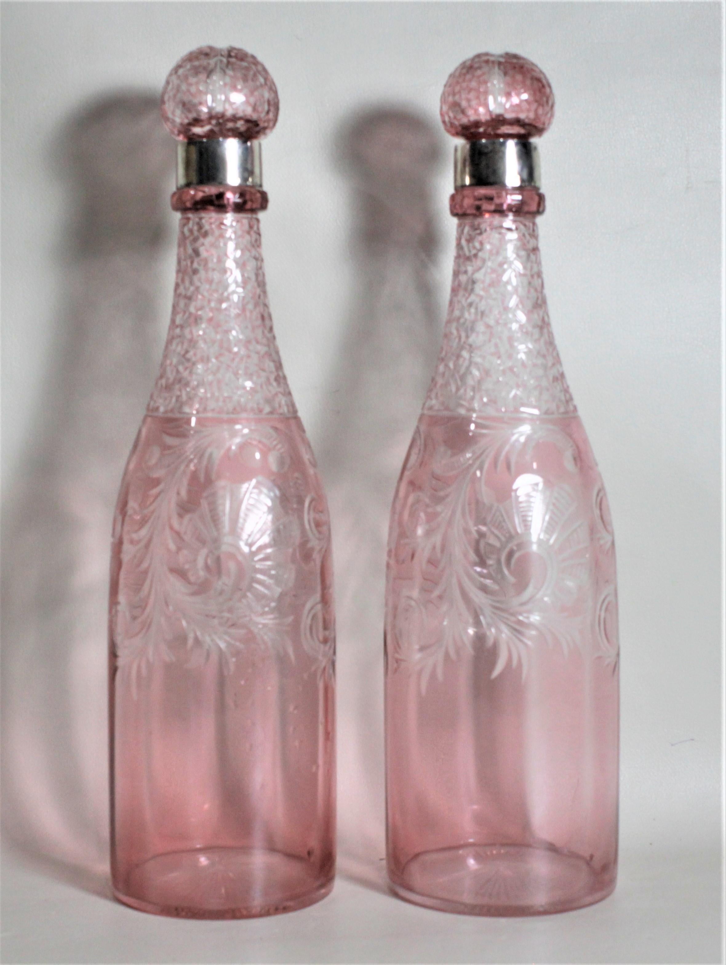 Sterling Silver Pair of Antique Pink Cranberry Cut Glass Bottle Decanters with Sterling Rims