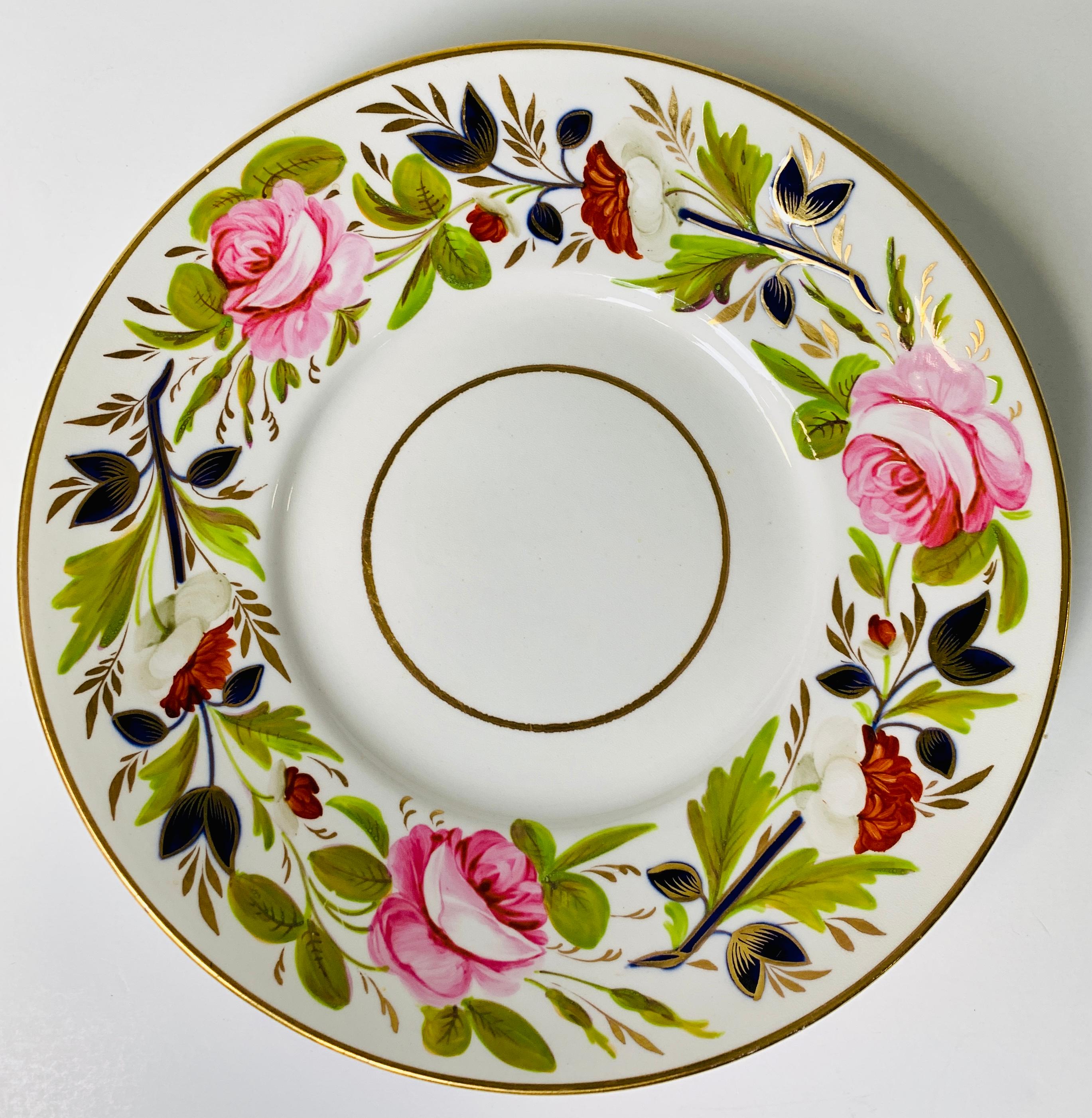 A pair of Antique English porcelain dishes hand-painted with beautiful pink peonies and other flowers were made in England circa 1830.
Placed by the front door, this lovely pair of dishes would give you and anyone walking into your home a cheerful