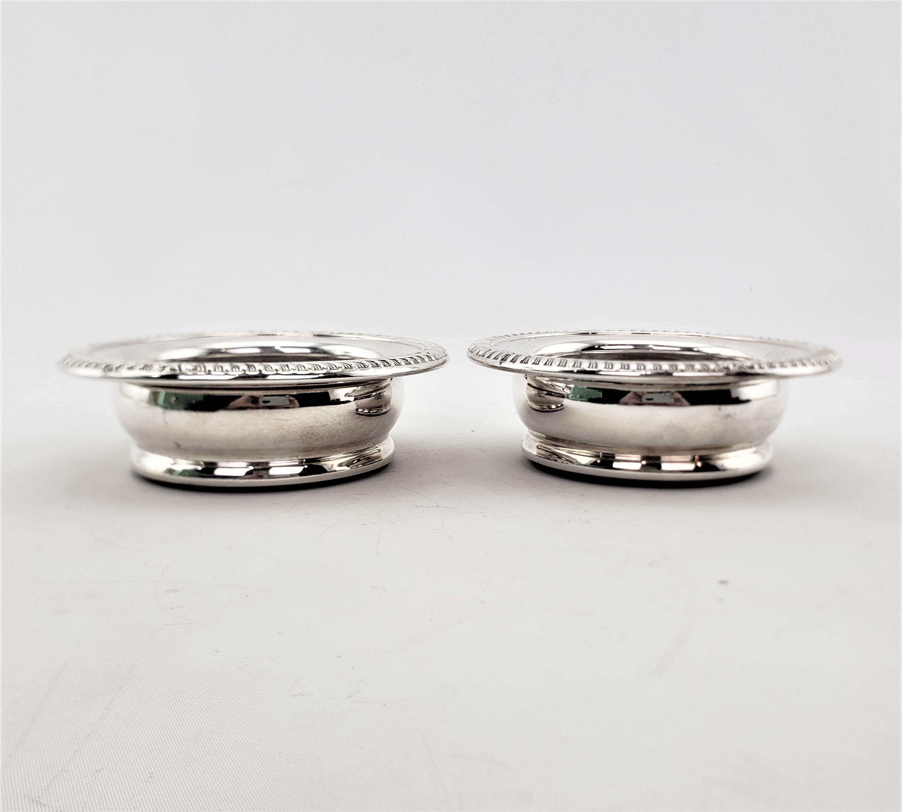 Pair of Antique English Silver Plated Bottle Coasters with Turned Wooden Inserts In Good Condition For Sale In Hamilton, Ontario