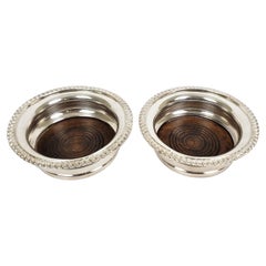 Pair of Antique English Silver Plated Bottle Coasters with Turned Wooden Inserts