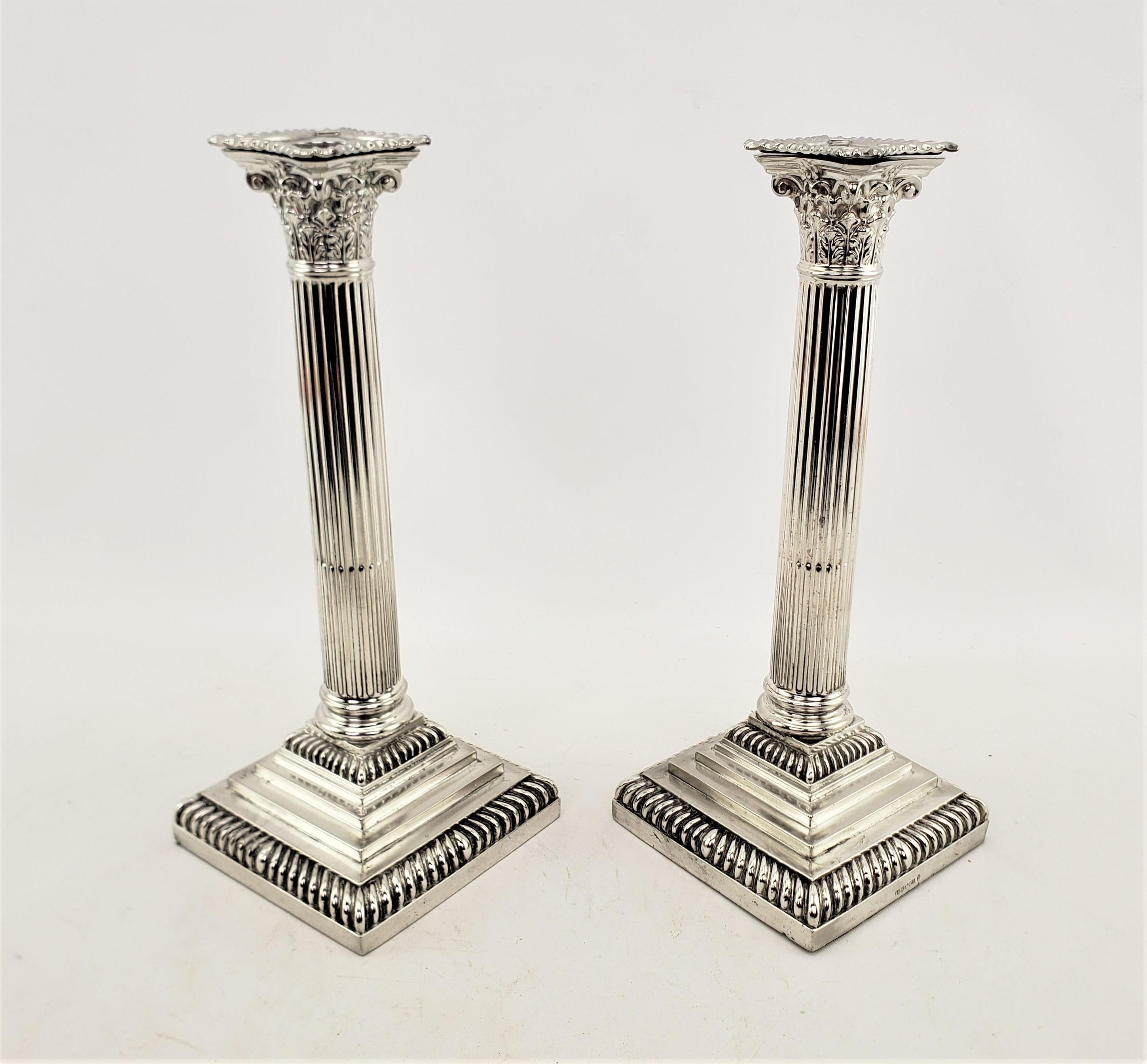 20th Century Pair of Antique English Silver Plated Candlesticks in a Corinthian Column Style For Sale