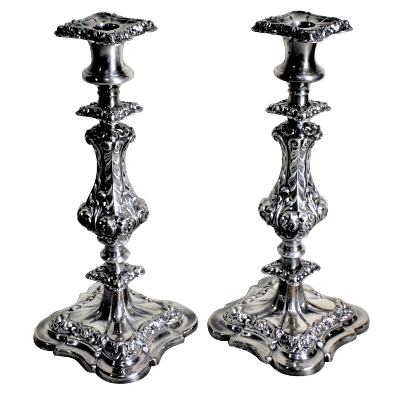 Pair of Antique English Silver Plated Candlesticks with Chased Leaf Decoration For Sale