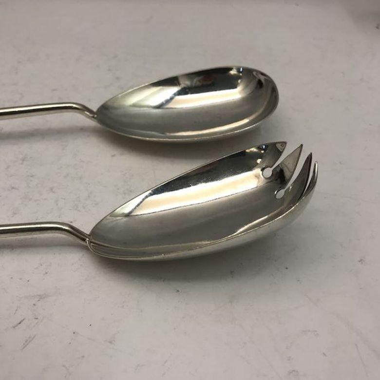 A matching pair of antique silver salad servers made in Sheffield, 1915.


 