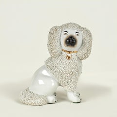 Pair of Antique English Staffordshire Poodle Figures