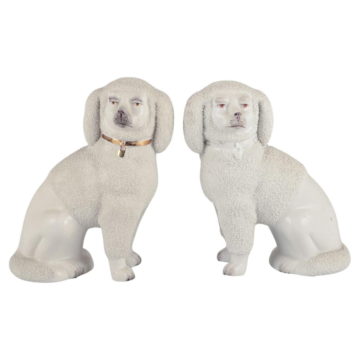 Pair of antique English Staffordshire porcelain dogs. Approx. 1900
