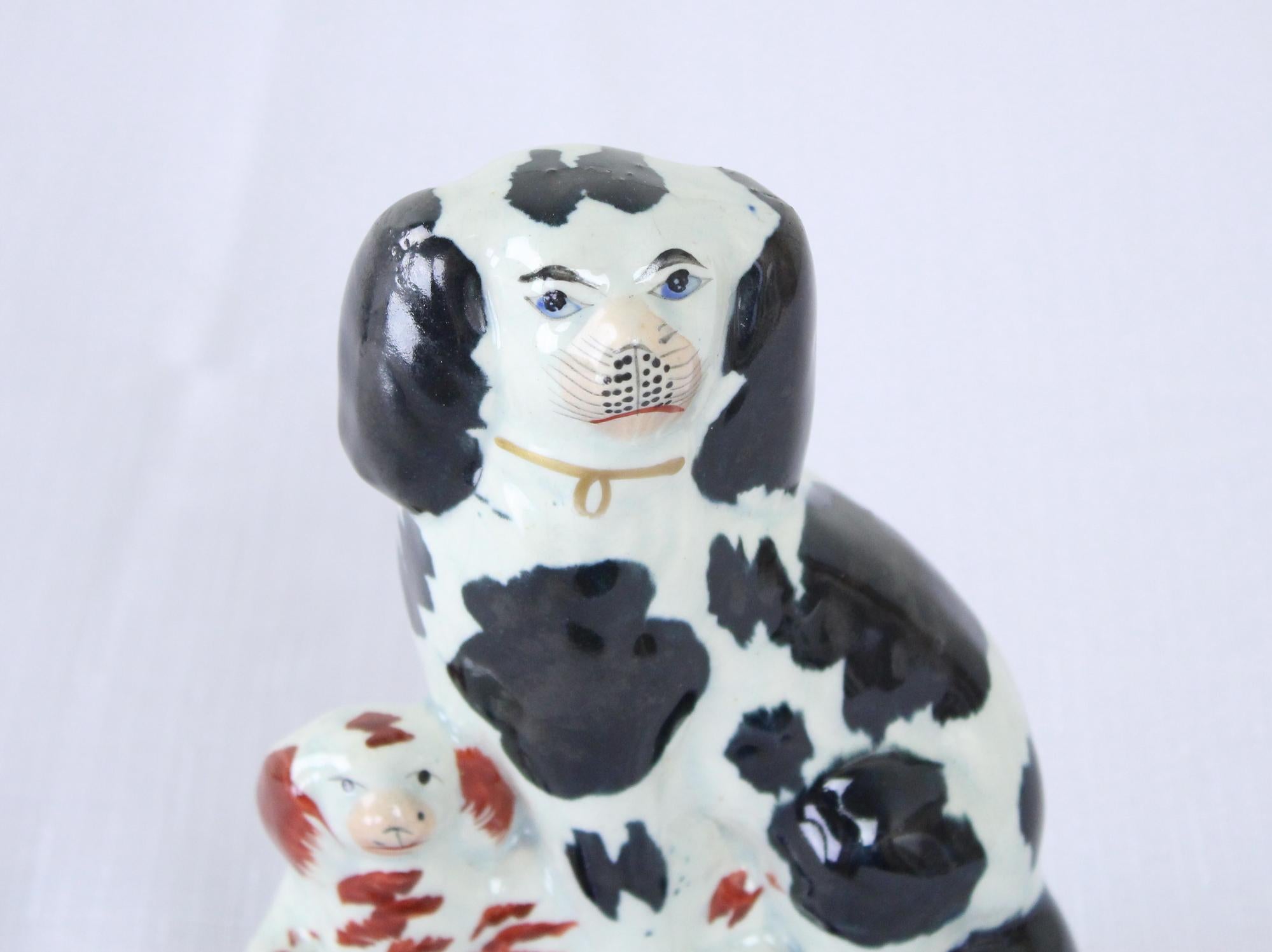 19th Century Pair of Decorative English Staffordshire Pottery Dogs