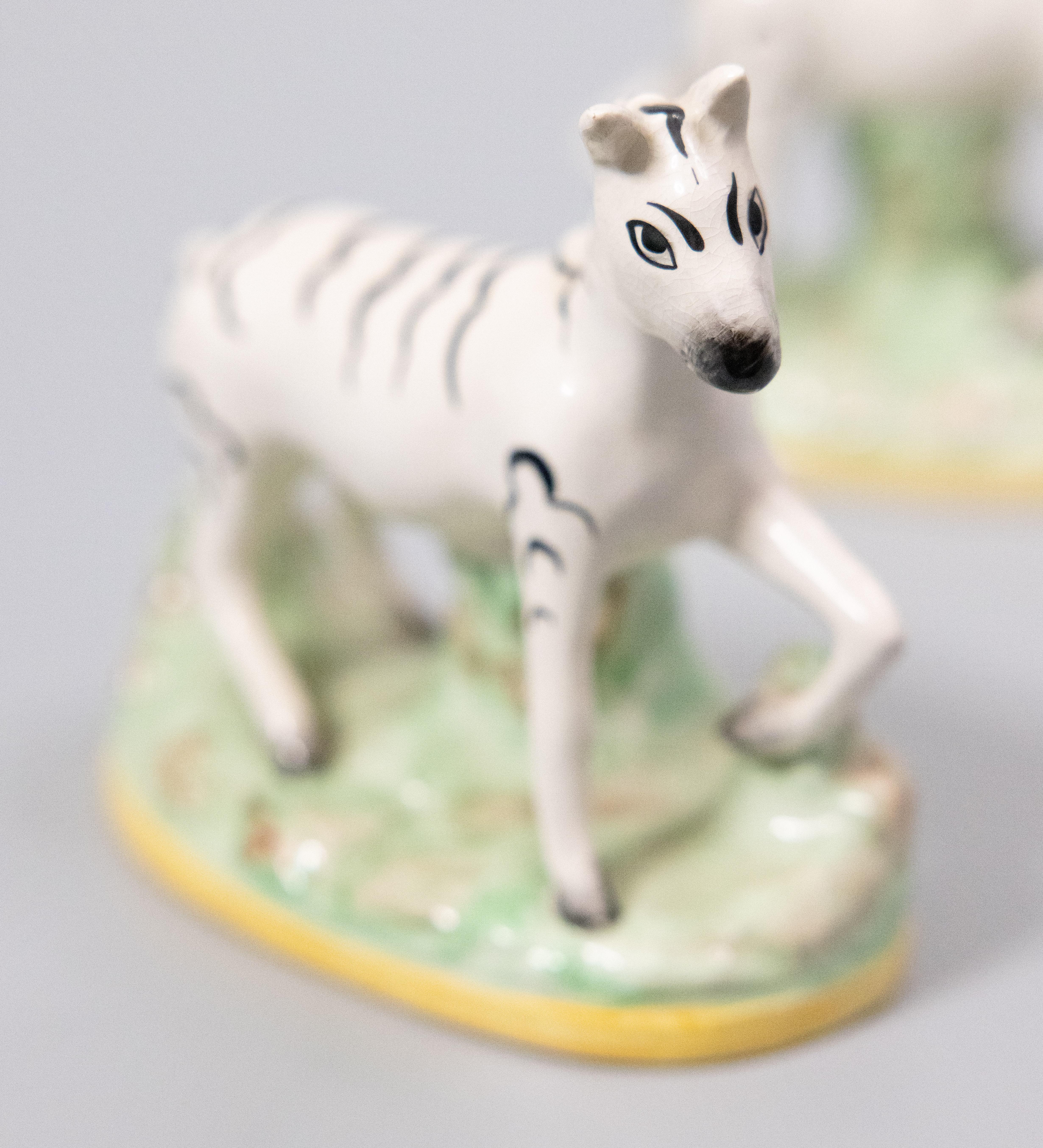 Ceramic Pair of Antique English Staffordshire Zebras Figurines For Sale