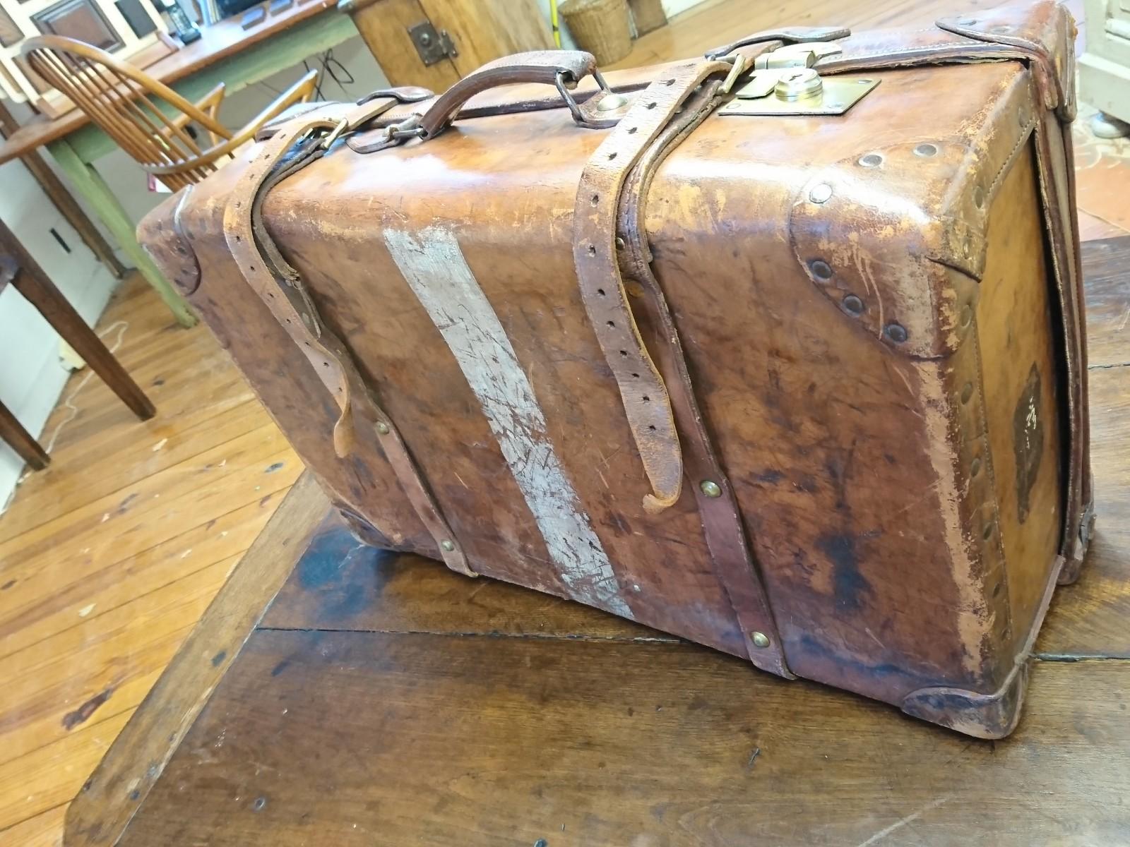 antique suitcases and trunks