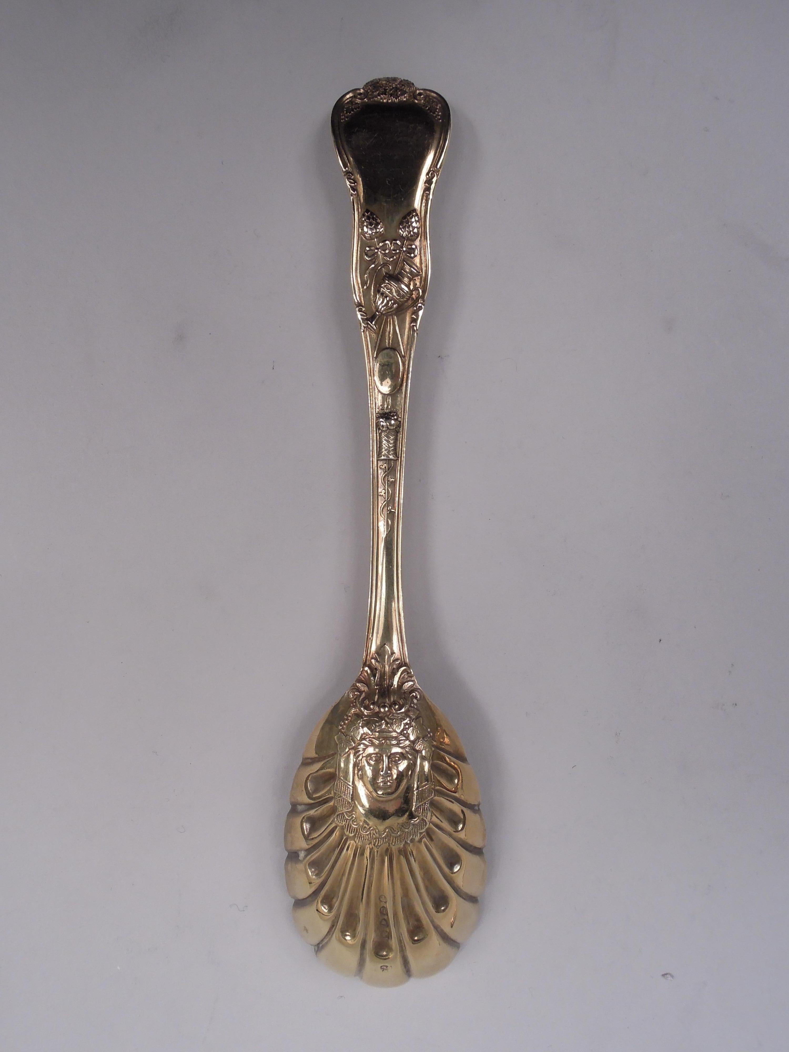 Pair of Stag Hunt gilt sterling silver berry serving spoons. Made by Made by Wakely & Wheeler in London in 1886. Each: The historic pattern with Classical frieze depicting lolling nudes and man astride beast. Scallop shell bowl. Fully marked. Total