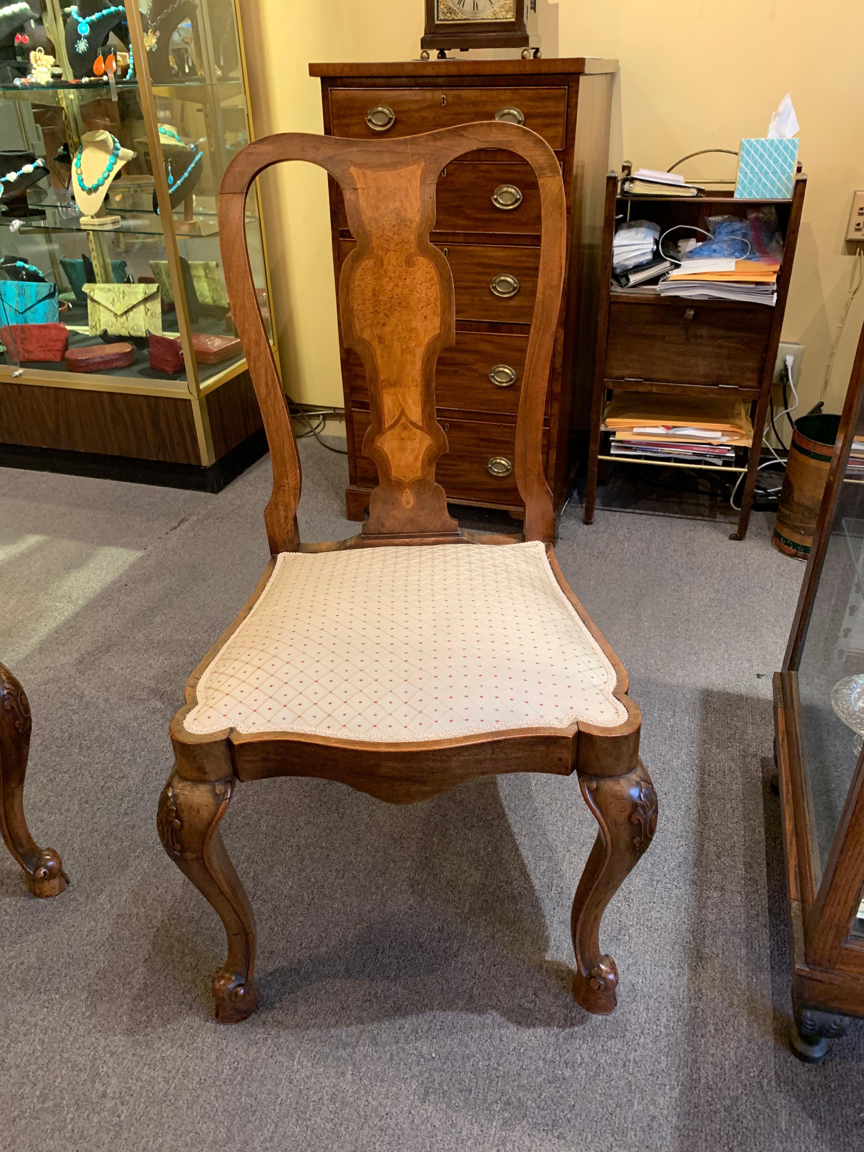Pair of antique English walnut side chairs.
