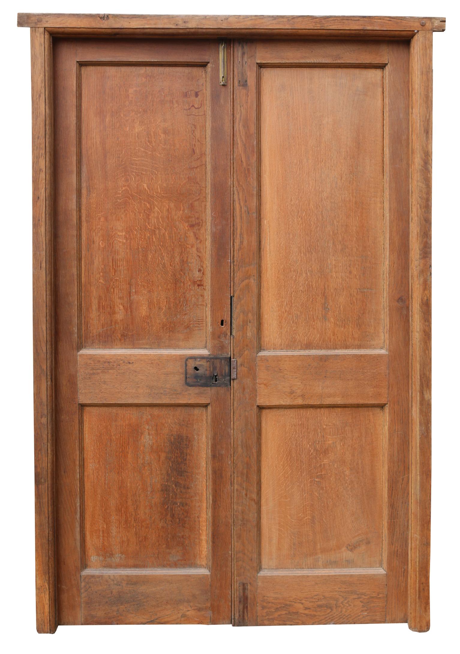 About

A pair of exterior oak double doors with original oak frame. Weathered silver grey finish to the front / exterior side.

Condition report

Stripped finish. Good structural condition. Small holes and marks from previous