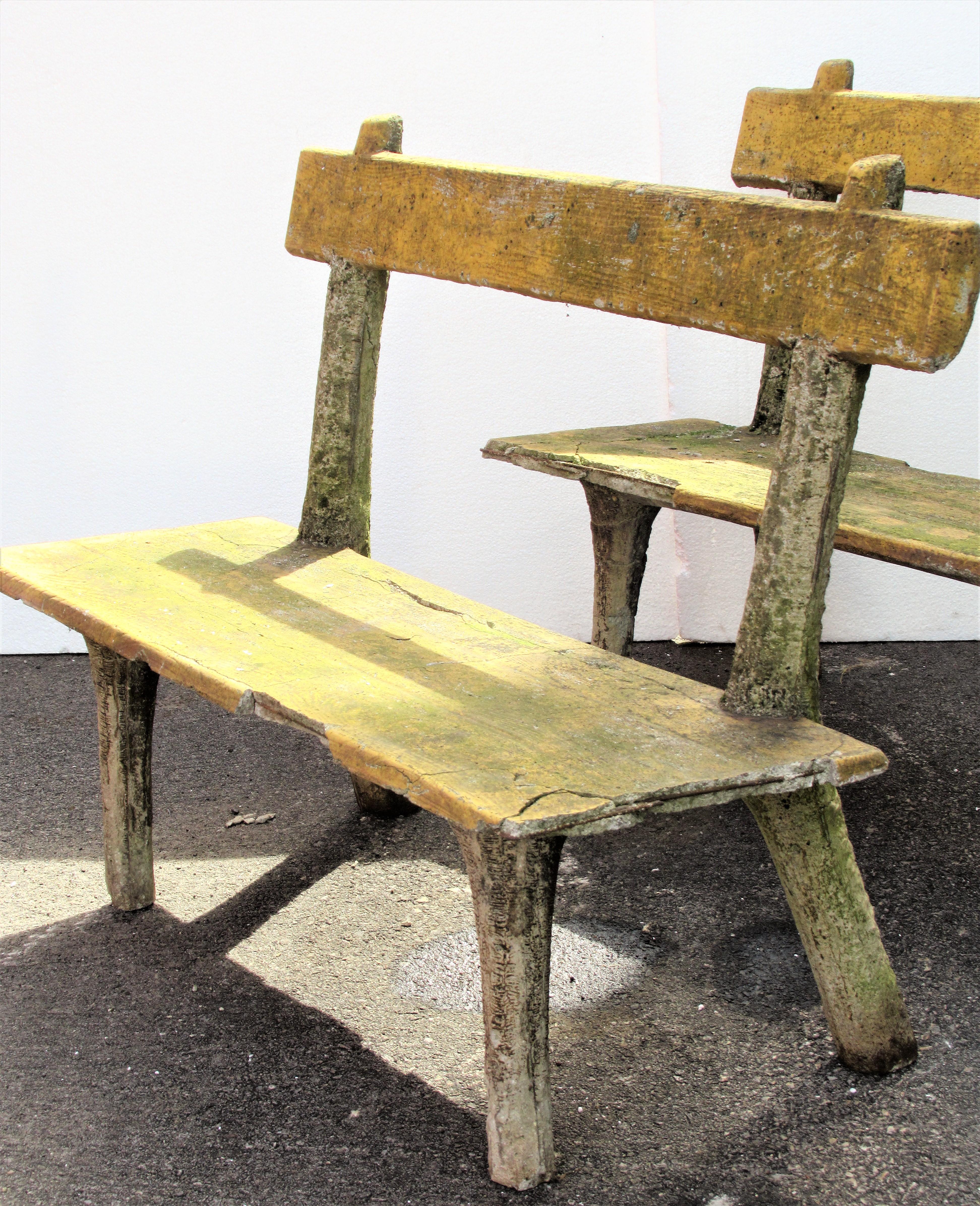 Pair of antique faux bois garden benches in all original beautifully aged weathered surface and color from many years of exposure to the elements. Continental European - France or Belgium in origin - dating from the early 1900s. Look at all pictures