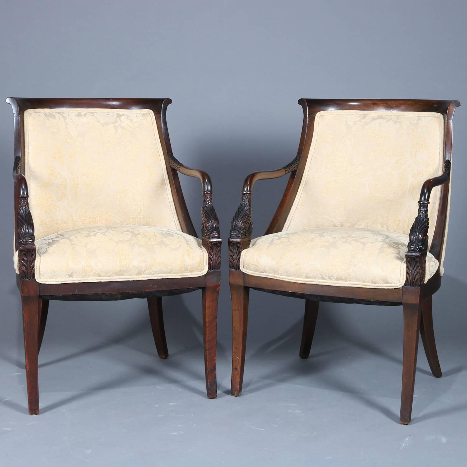 Antique pair of figural Continental carved mahogany chairs feature open arms with cared dolphins and raised on flared and tapered legs, upholstered, 19th century

Measures: 37.5