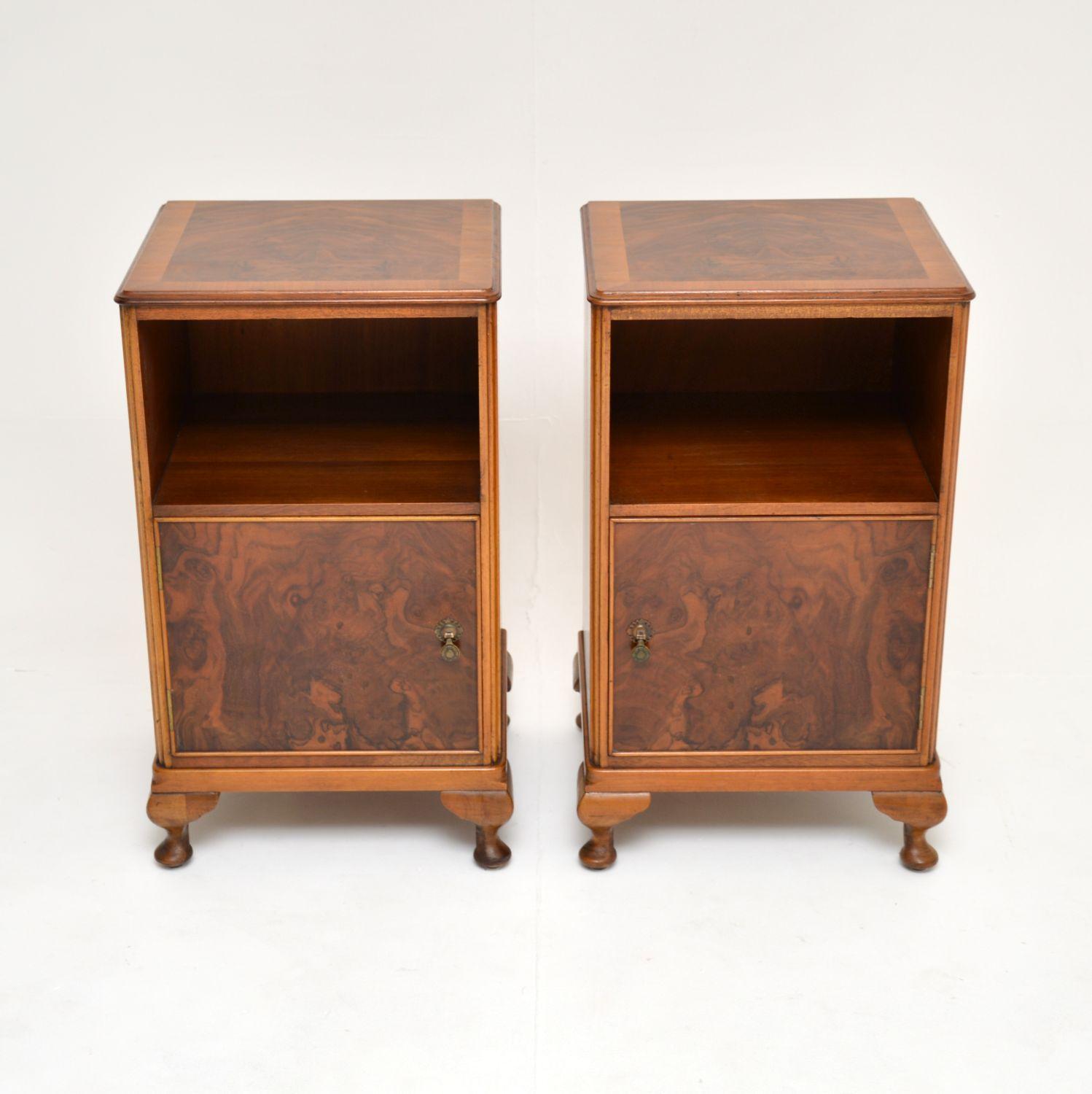 A superb pair of antique walnut bedside cabinets in the Queen Anne style. They were made in England, they date from around the 1920-30’s.

The quality is outstanding, they are beautifully constructed and have a very useful design. The tops are cross