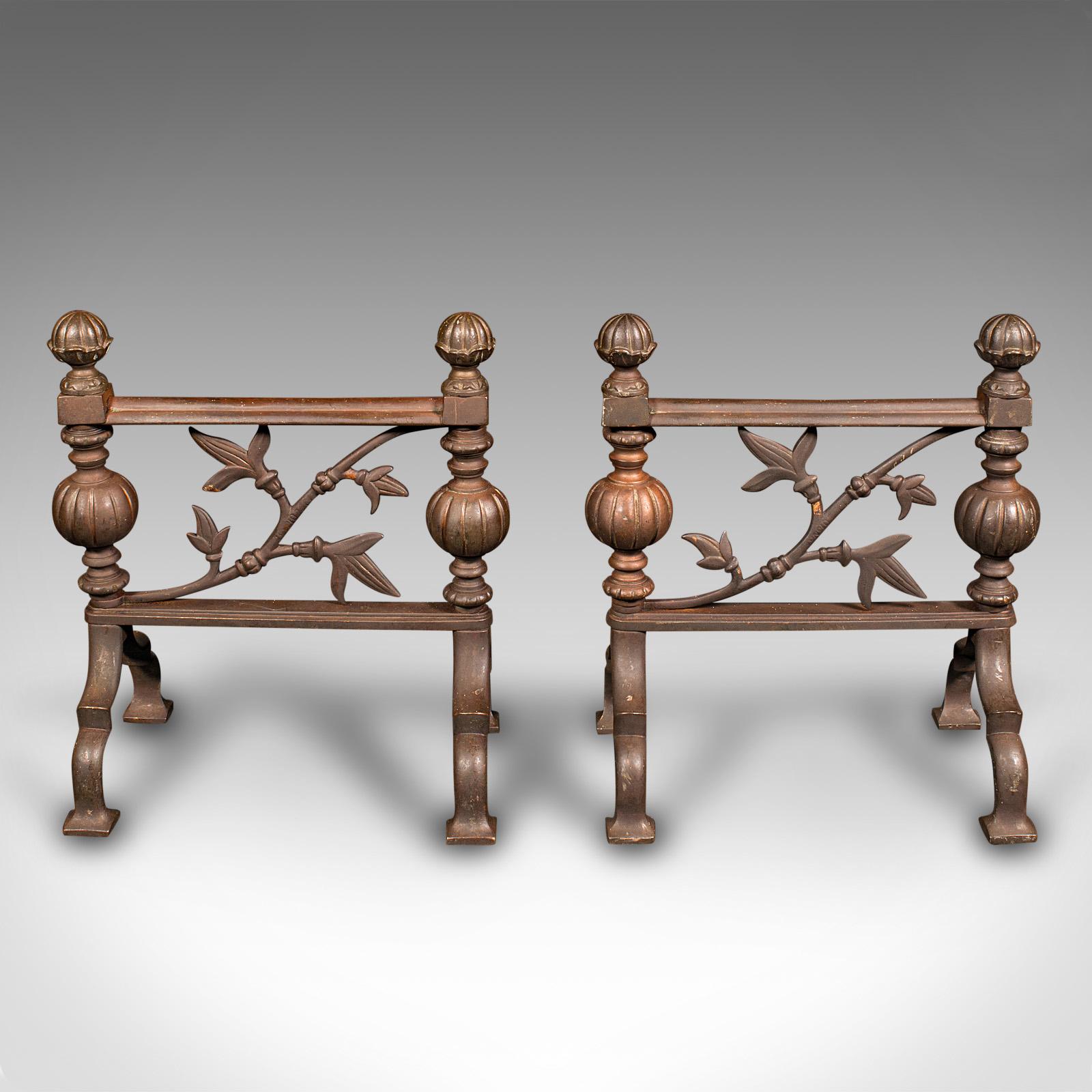 This is a pair of antique fireside tool rests. An English, bronze decorative fireplace accessory in Aesthetic period taste, dating to the late Victorian era, circa 1890.

Wonderfully decorative rests, adding a dash to the fireplace
Displaying a