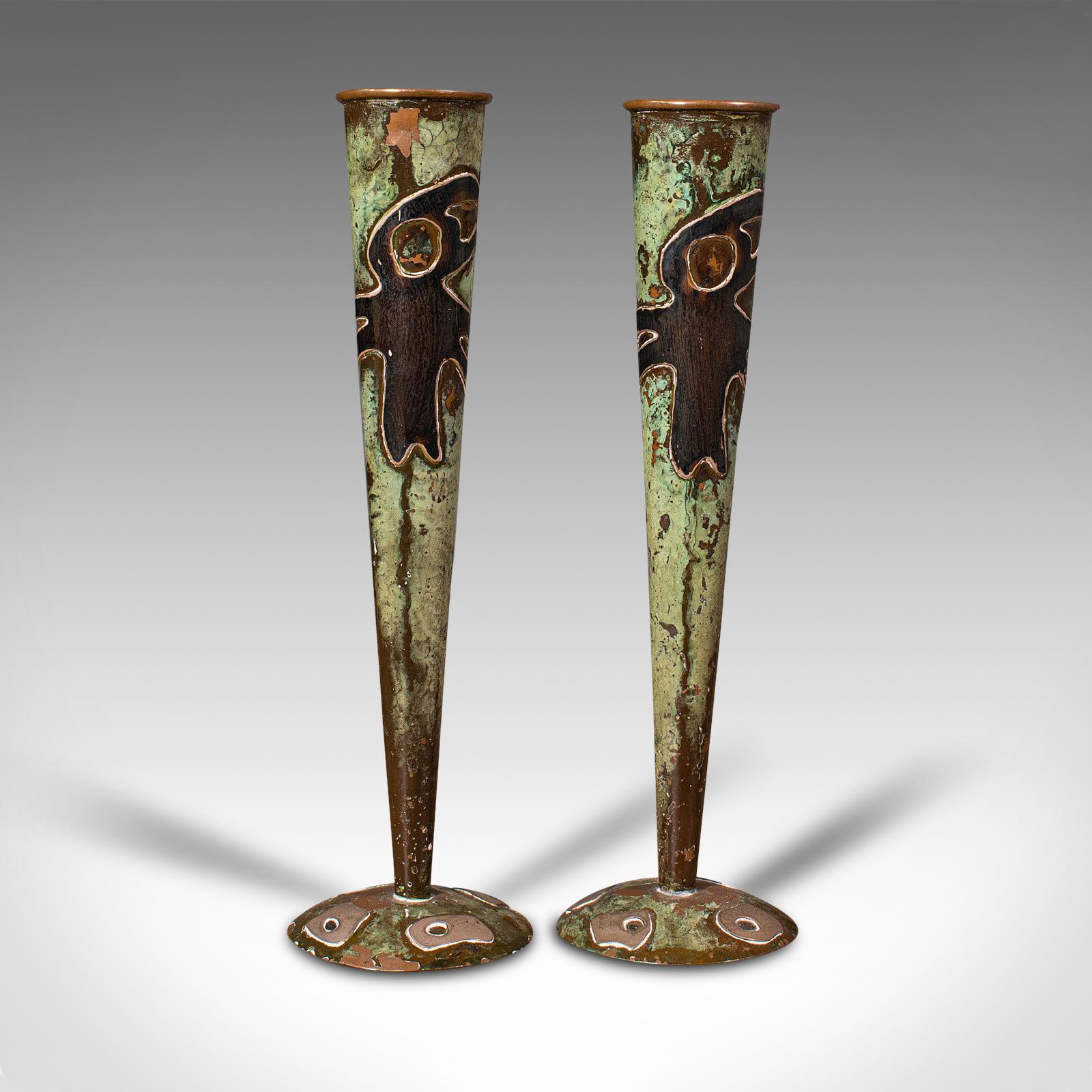 This is an antique pair of flute vases. A French, copper posy vase in Art Nouveau taste, dating to the early 20th century, circa 1920.

Charming example of the Art Nouveau taste
Displays a desirable aged patina and in good order
Patinated copper