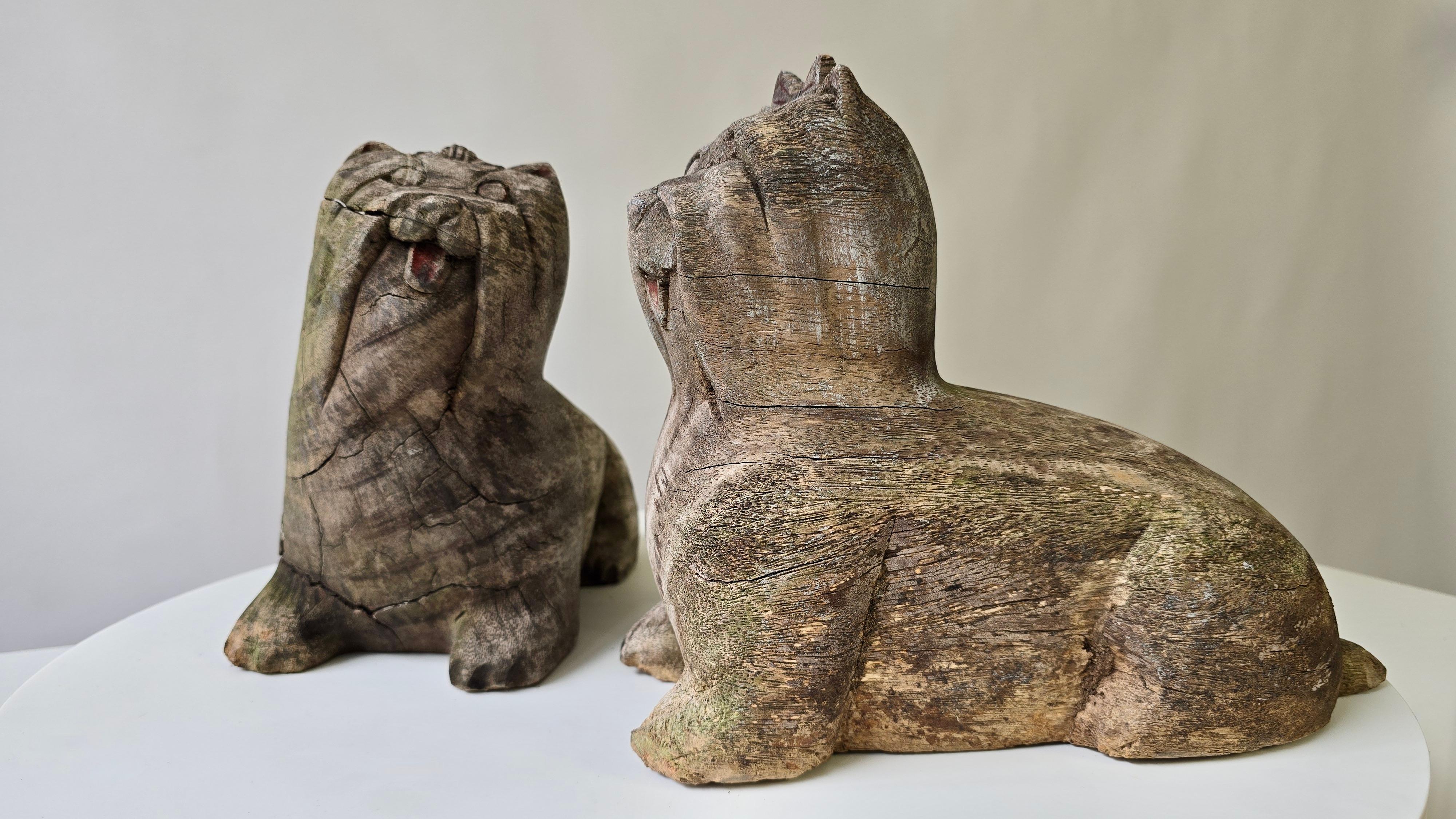 Hand-Carved Pair of Antique Folk Art Carved Wooden Maltese Dog Sculptures For Sale