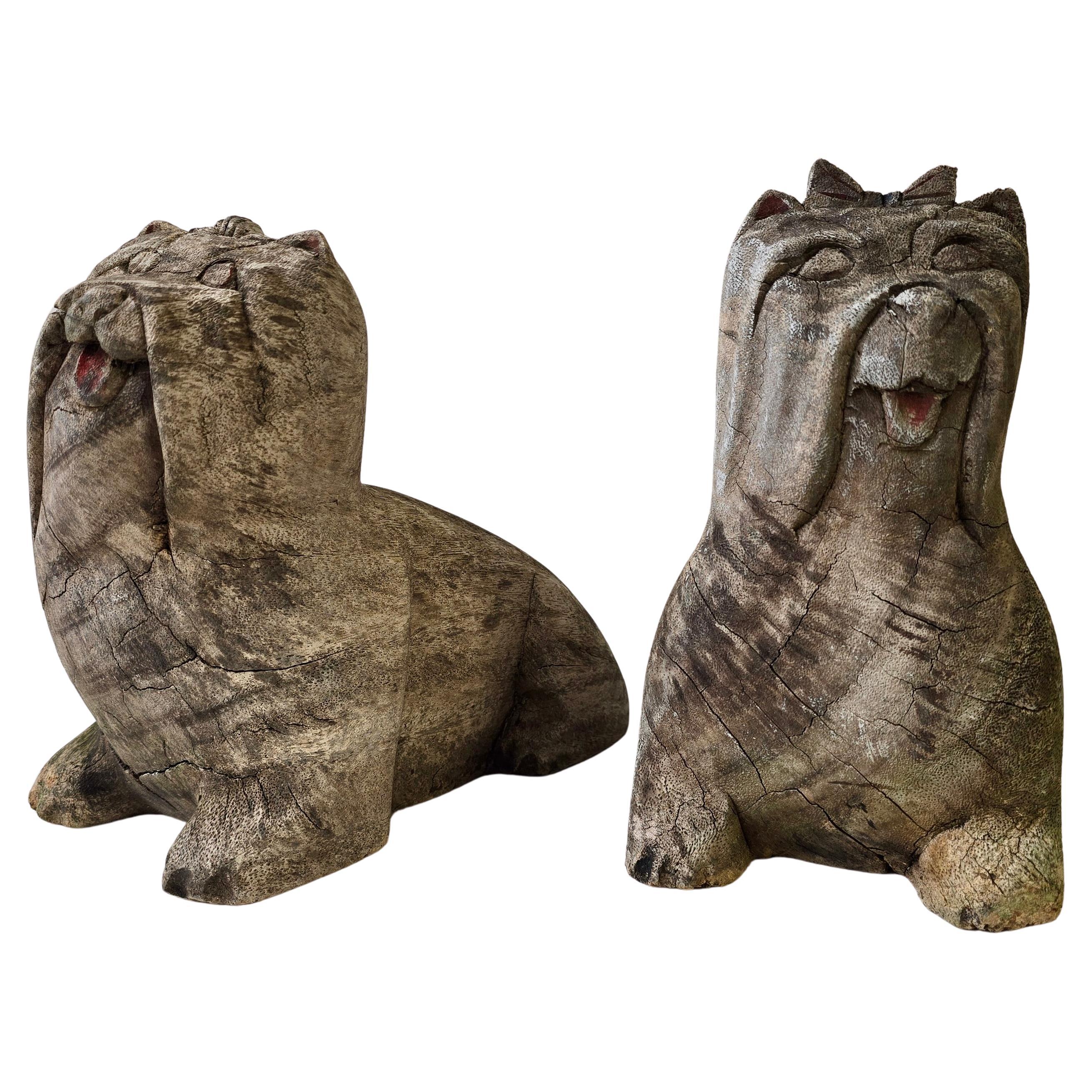 Pair of Antique Folk Art Carved Wooden Maltese Dog Sculptures For Sale