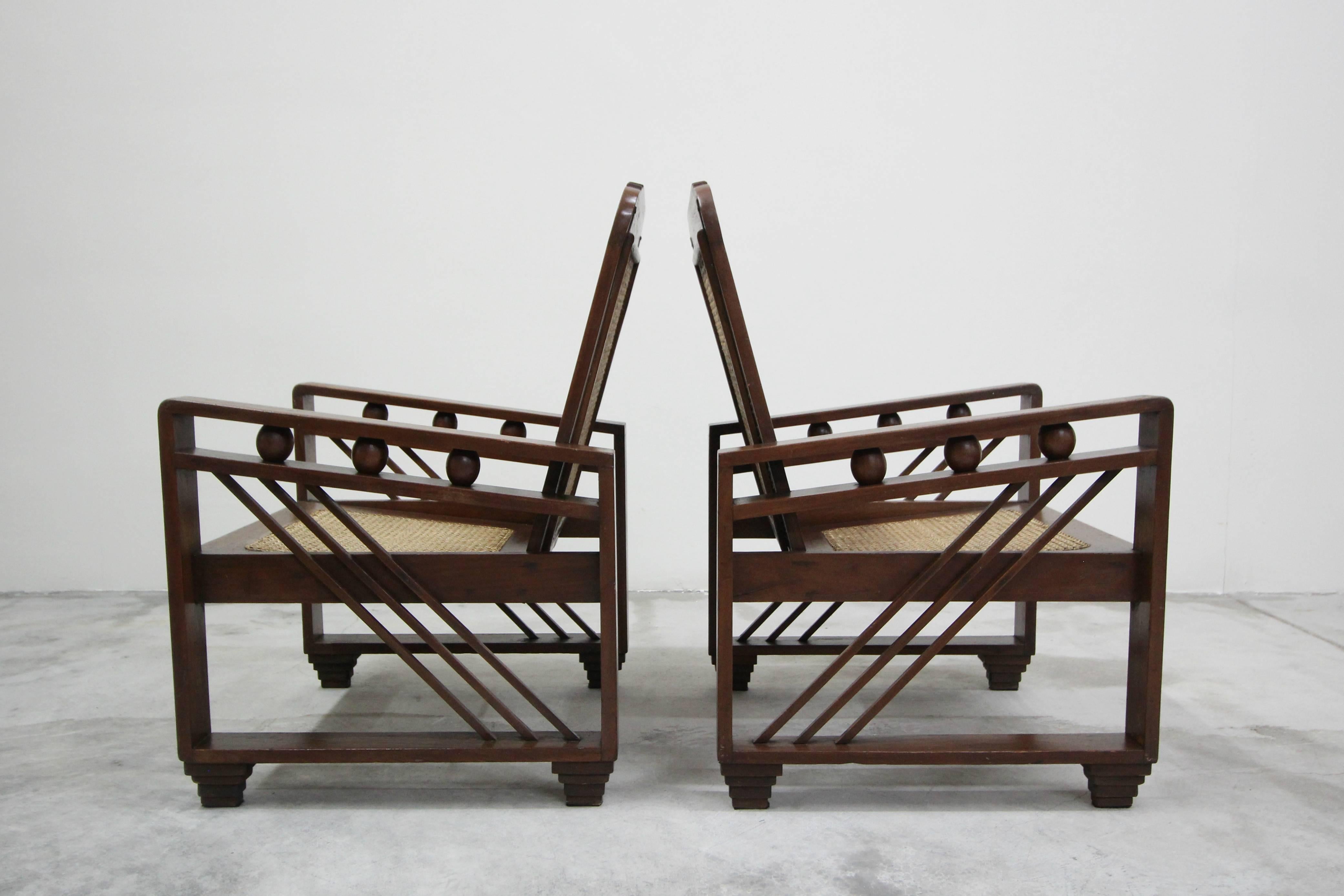 20th Century Pair of Antique French Art Deco Solid Wood Lounge Chairs with Cane Backs & Seats