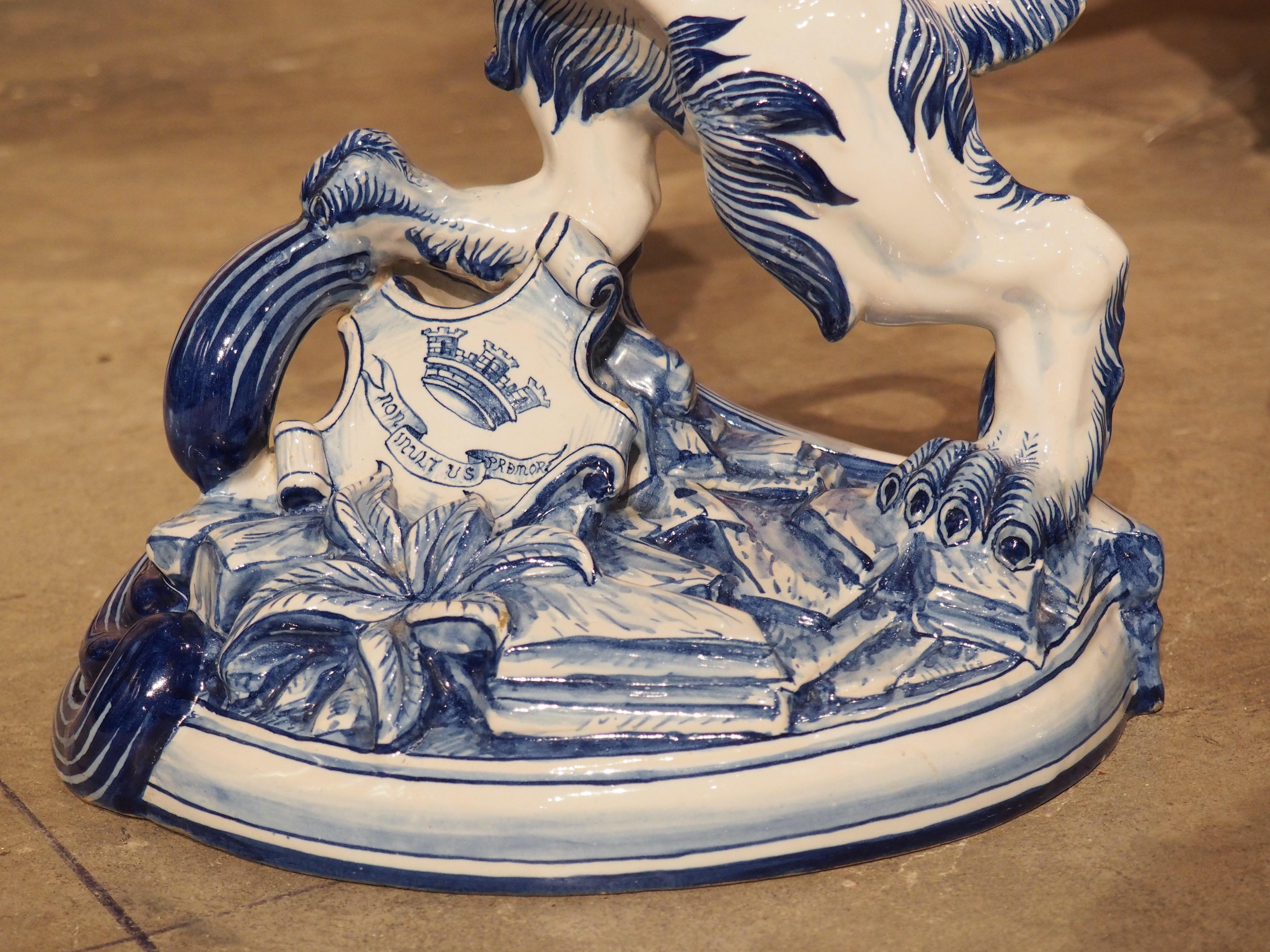 Pair of Antique French Blue and White Saint-Clément Faience Lion Candle Holders In Good Condition For Sale In Dallas, TX