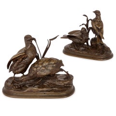 Paire d'anciens groupes d'oiseaux en bronze français