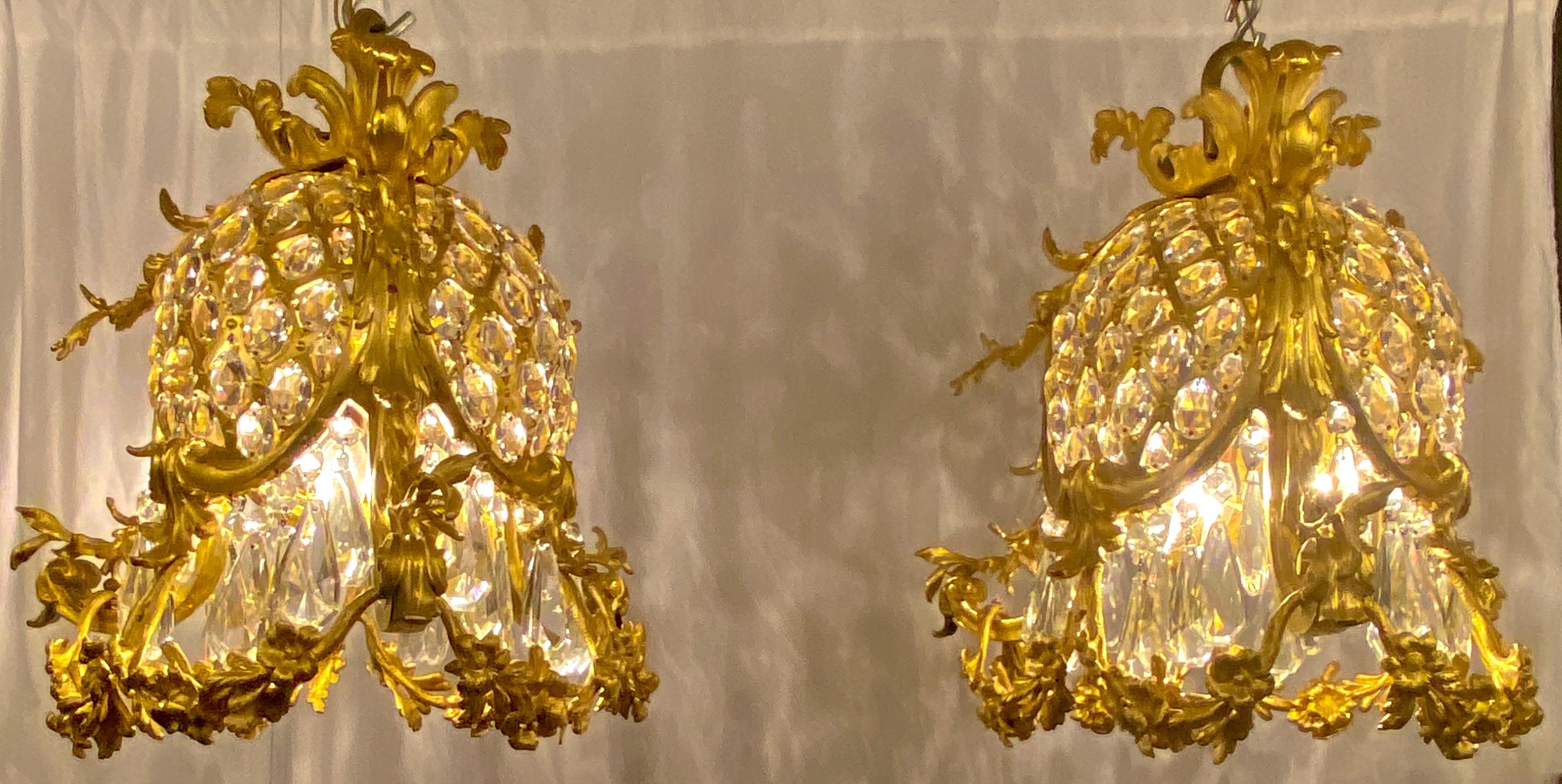 Pair of antique French bronze doré baccarat crystal empress Eugenie design chandeliers, circa 1890.