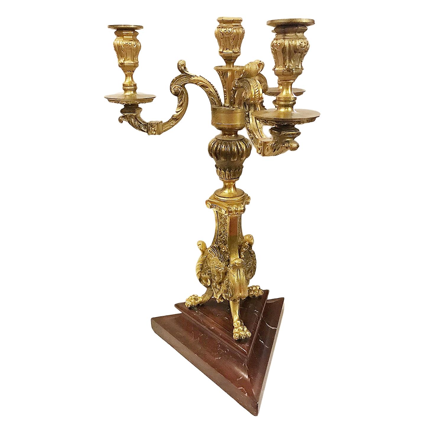 Pair of 19th century French bronze Doreé candlesticks with red marble bases.

Measurements:
Height 20.5