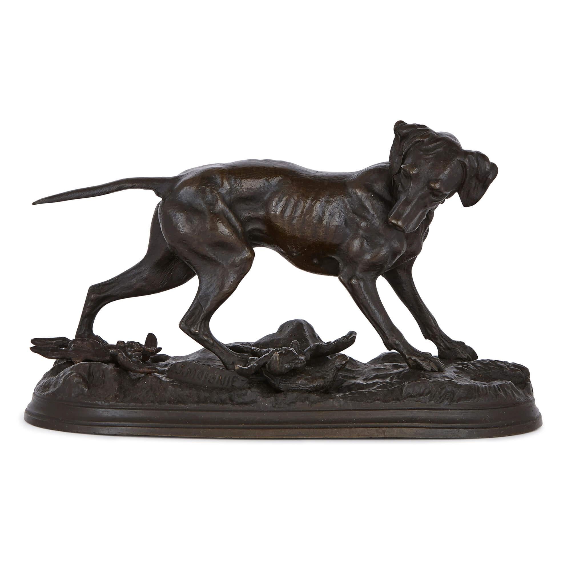 These charming bronze dogs are Fine works by the important 19th Century maker, Jules Moigniez (French, 1835-1894), and would make a unique gift to a dog-lover or those with an interest in antique sculpture. Each model shows a dog standing alert with