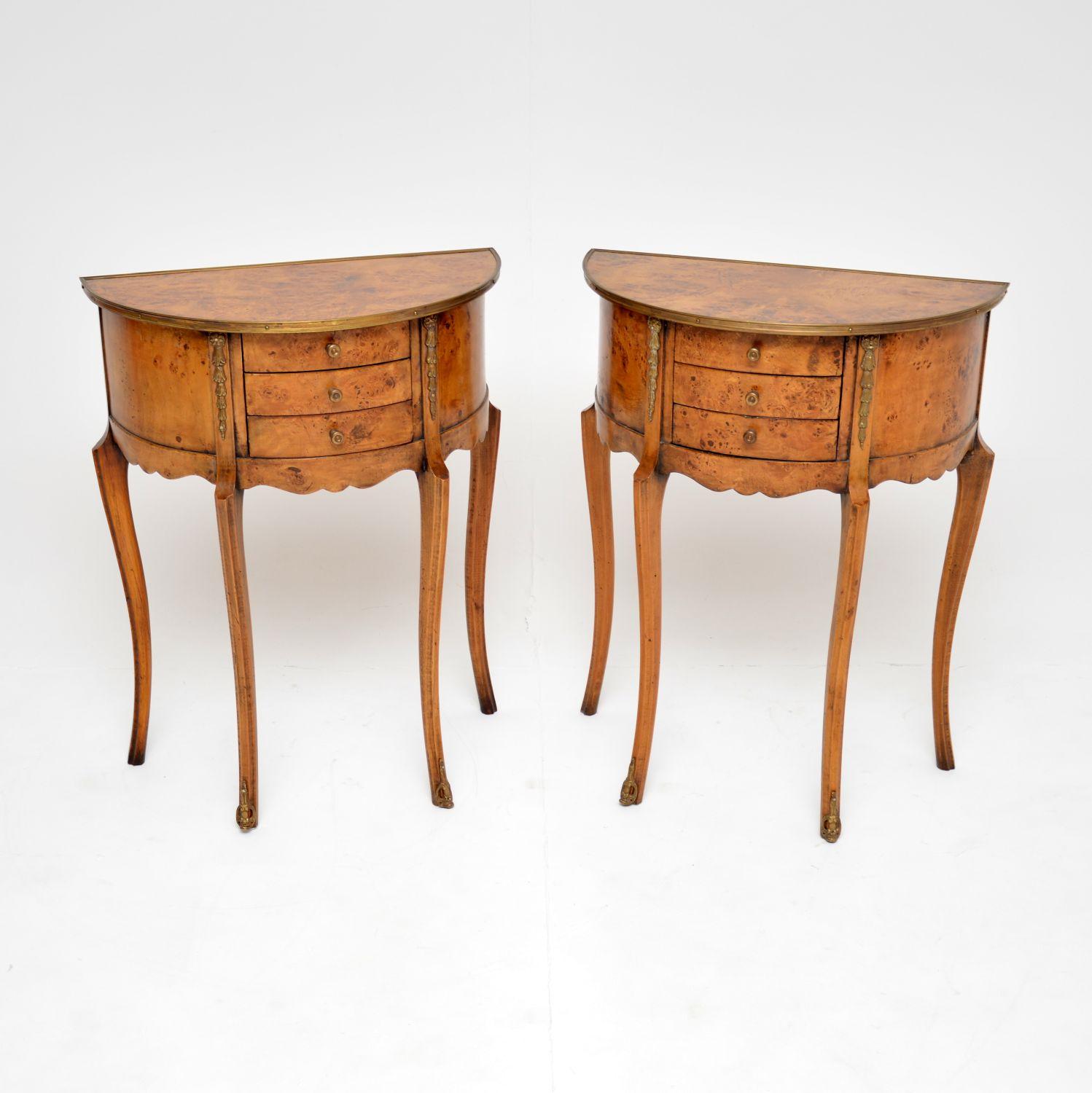 A stunning pair of demi-lune antique French side tables in burr walnut which I would date from around the 1950’s period.

They are beautifully made and are of lovely quality. The burr walnut grain patterns are gorgeous throughout, the demi-lune