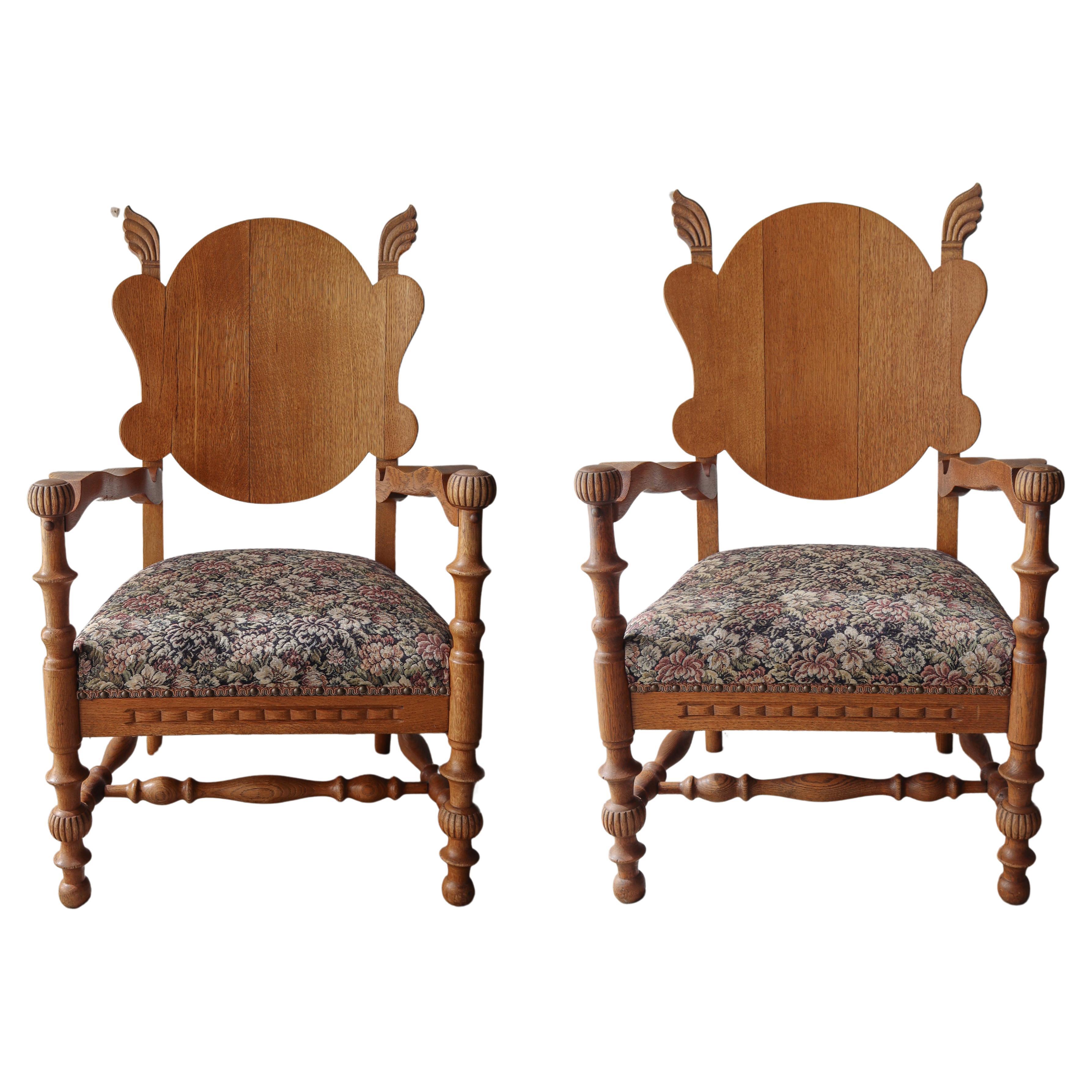 Pair of Antique French Carved Oak Lounge Chairs  For Sale